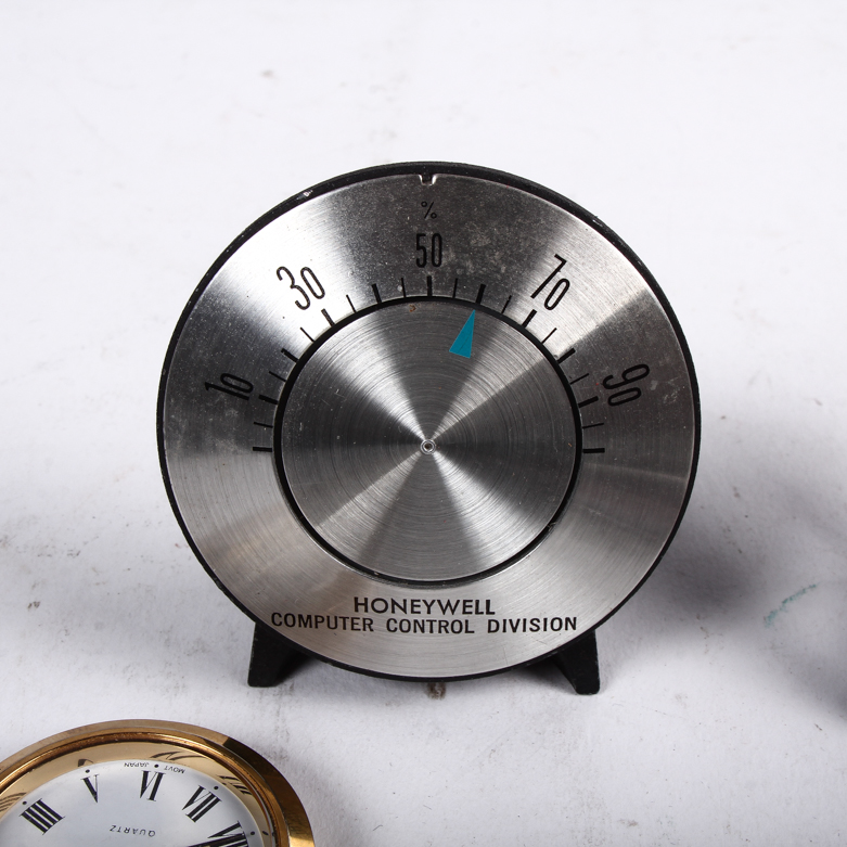 Collection of Clocks and Temperature Gauges