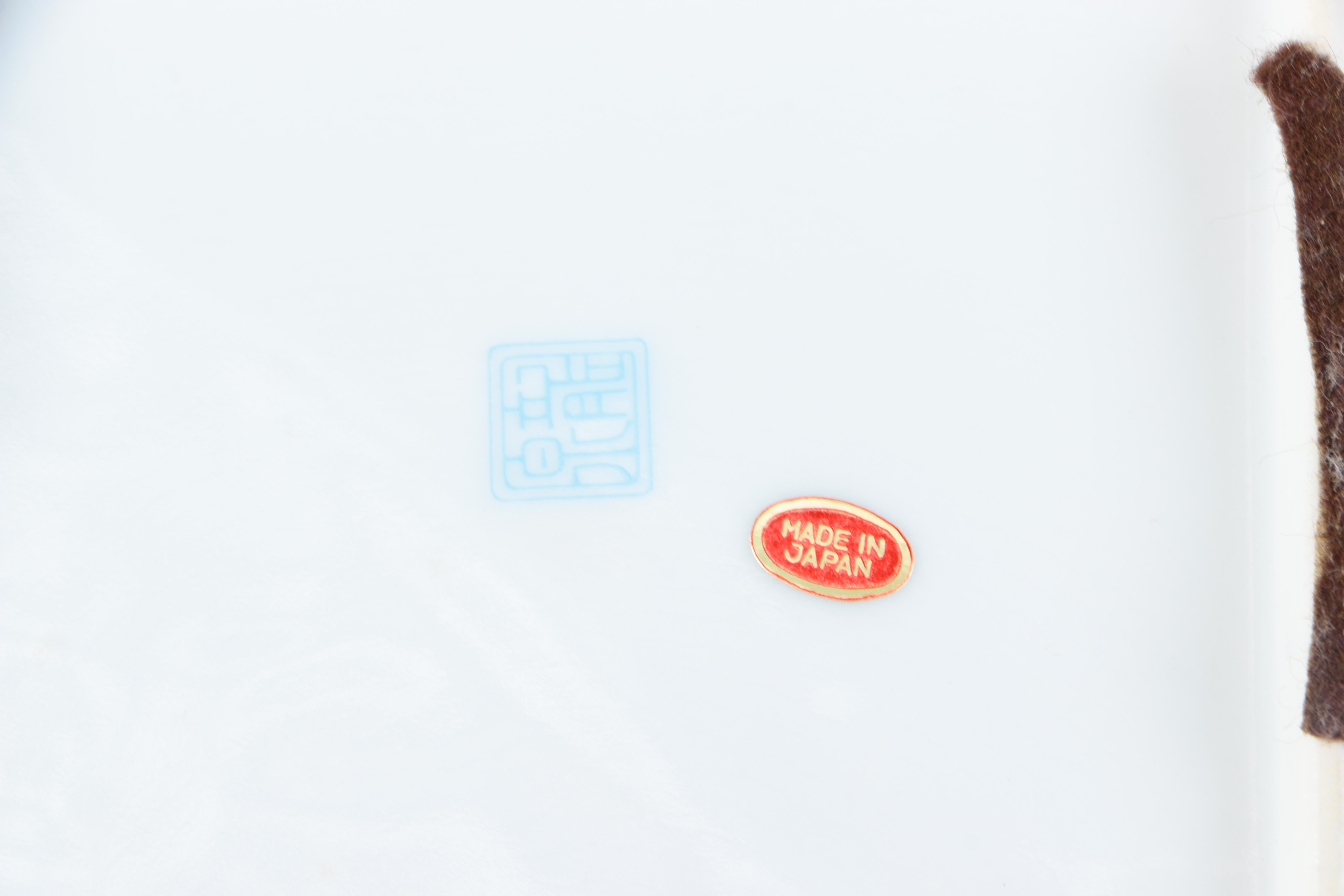 Assortment of Japanese Dishes Including Imari