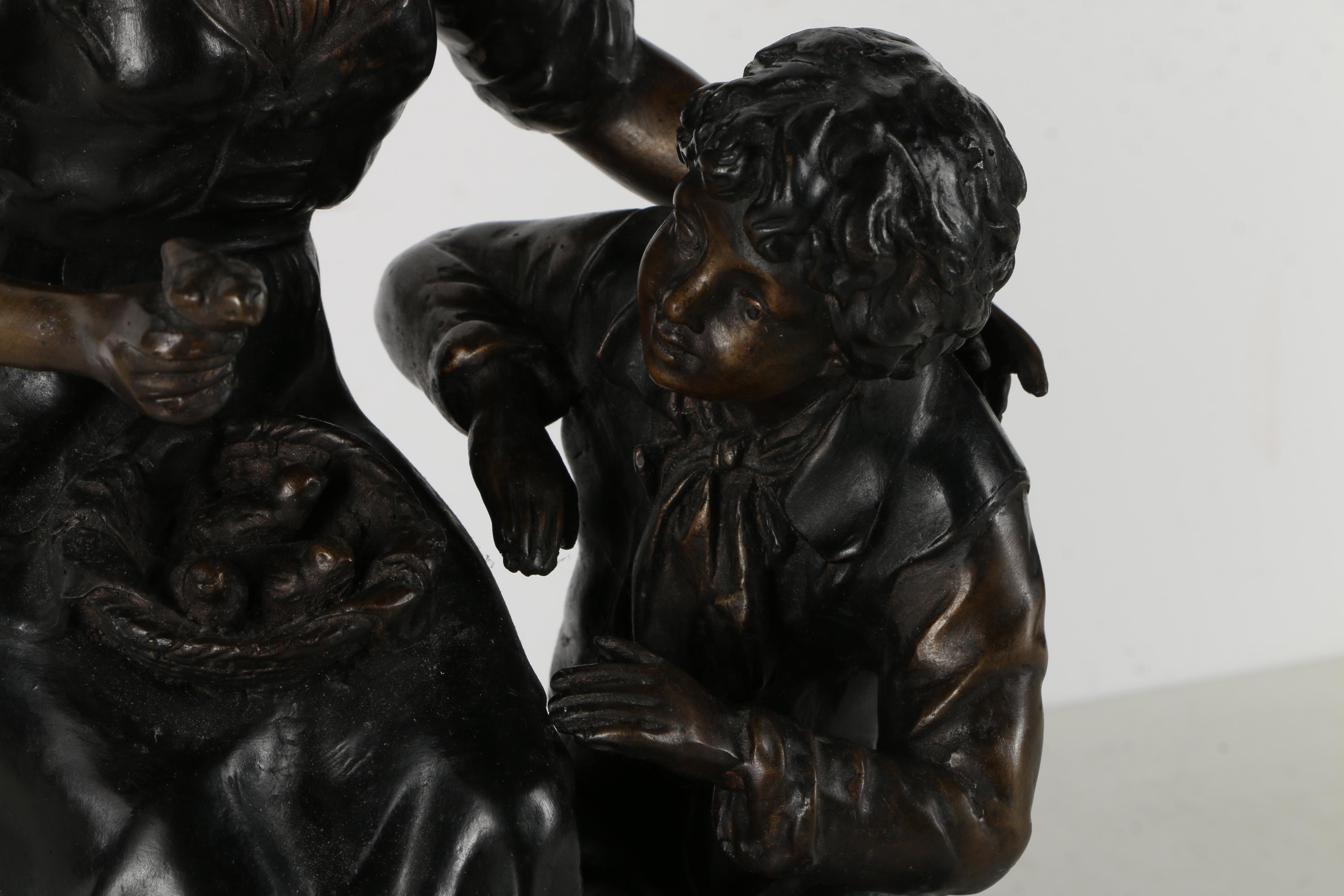 Brass Sculpture of a Woman and a Boy