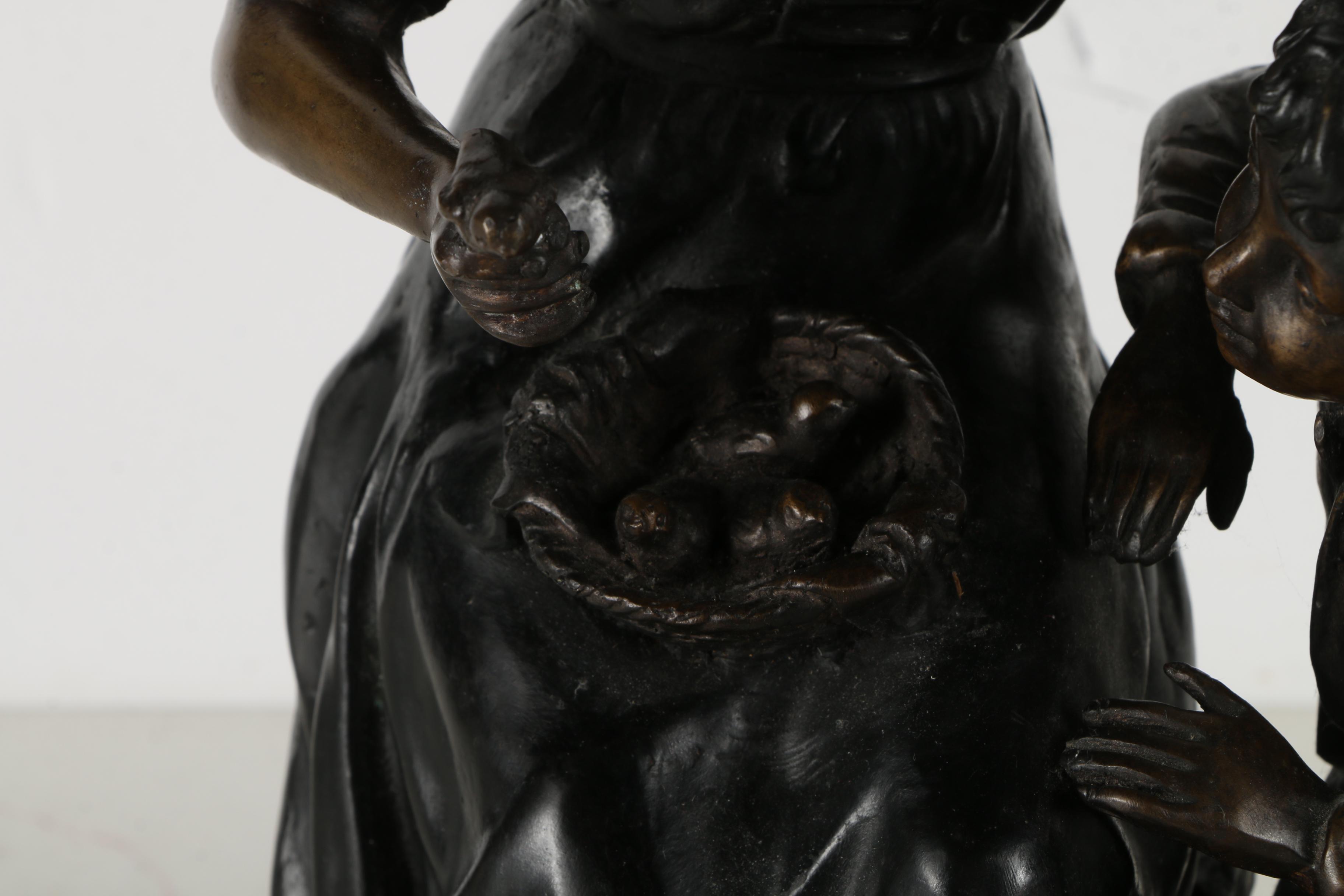 Brass Sculpture of a Woman and a Boy