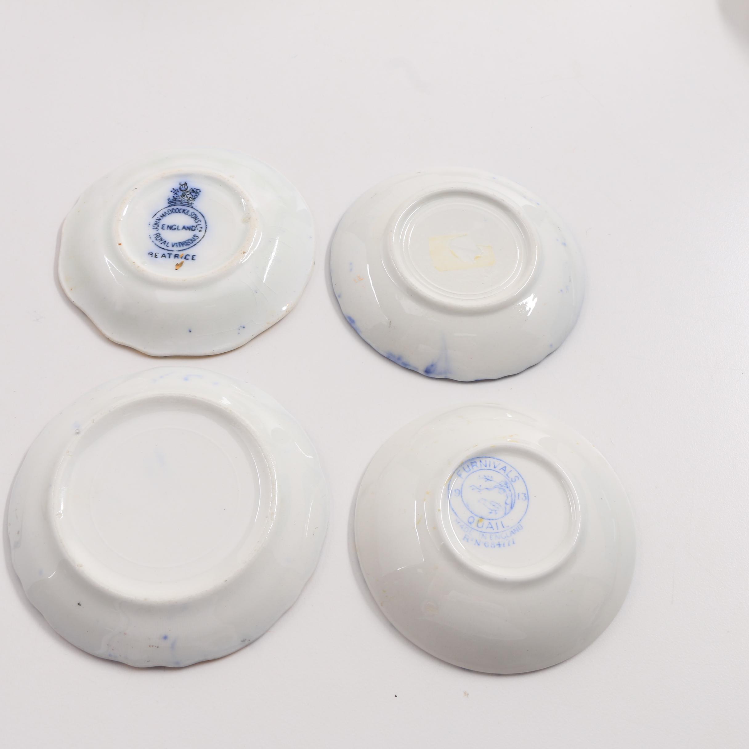 A Collection Of Over 40 Blue and White Butter Pats