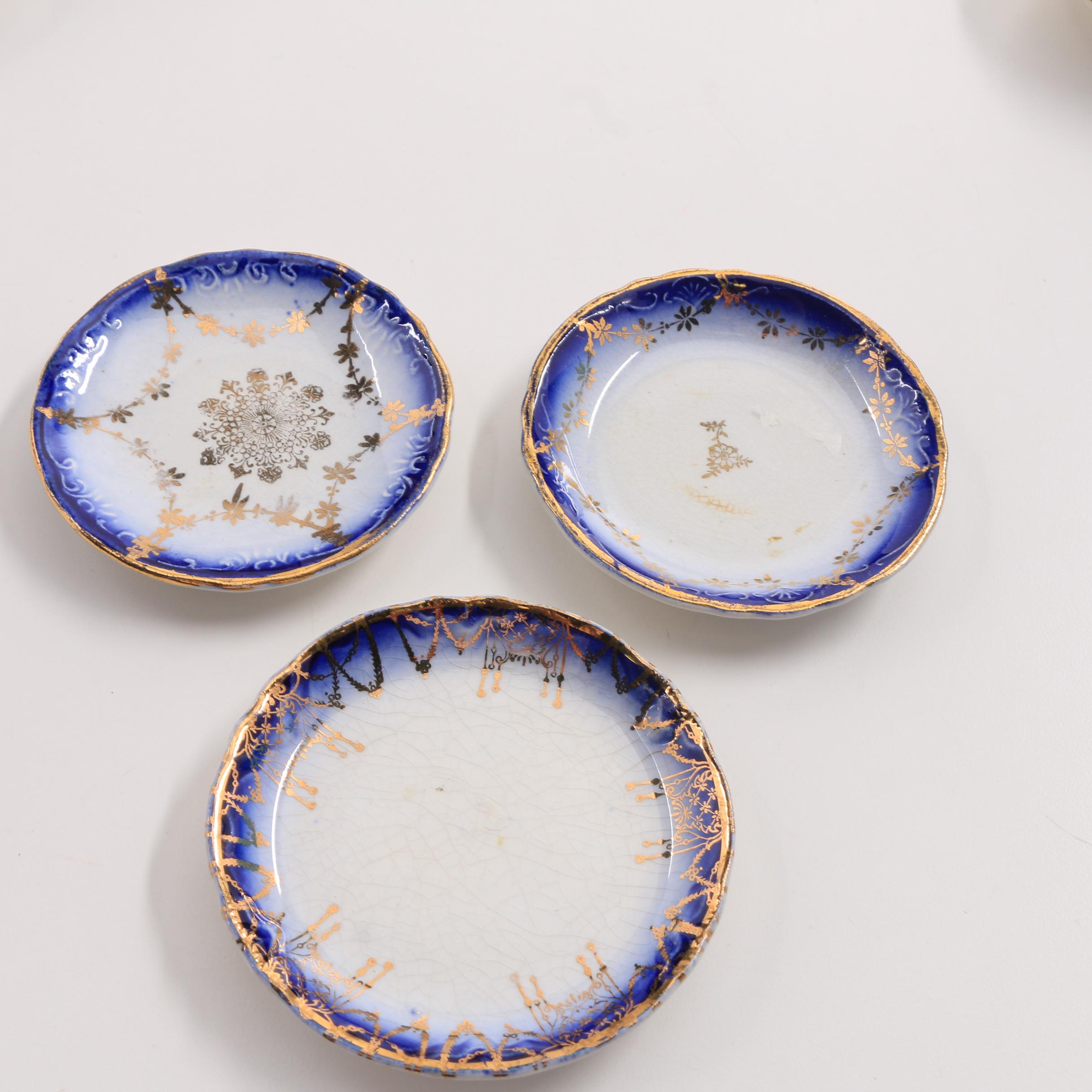 A Collection Of Over 40 Blue and White Butter Pats