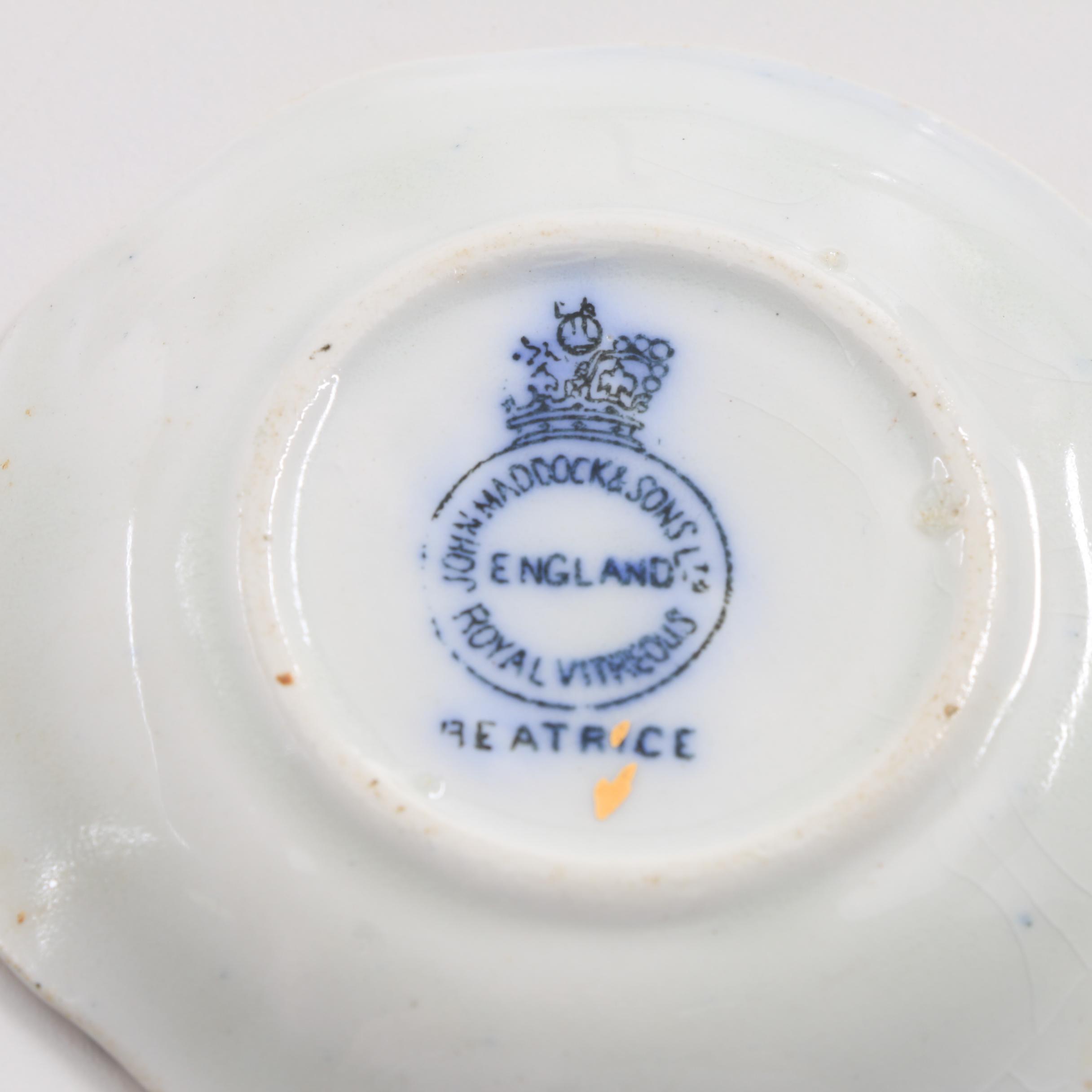 A Collection Of Over 40 Blue and White Butter Pats