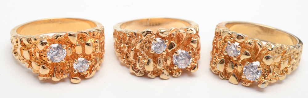 Eight Gold Nugget Style Costume Rings with Crystal Accents