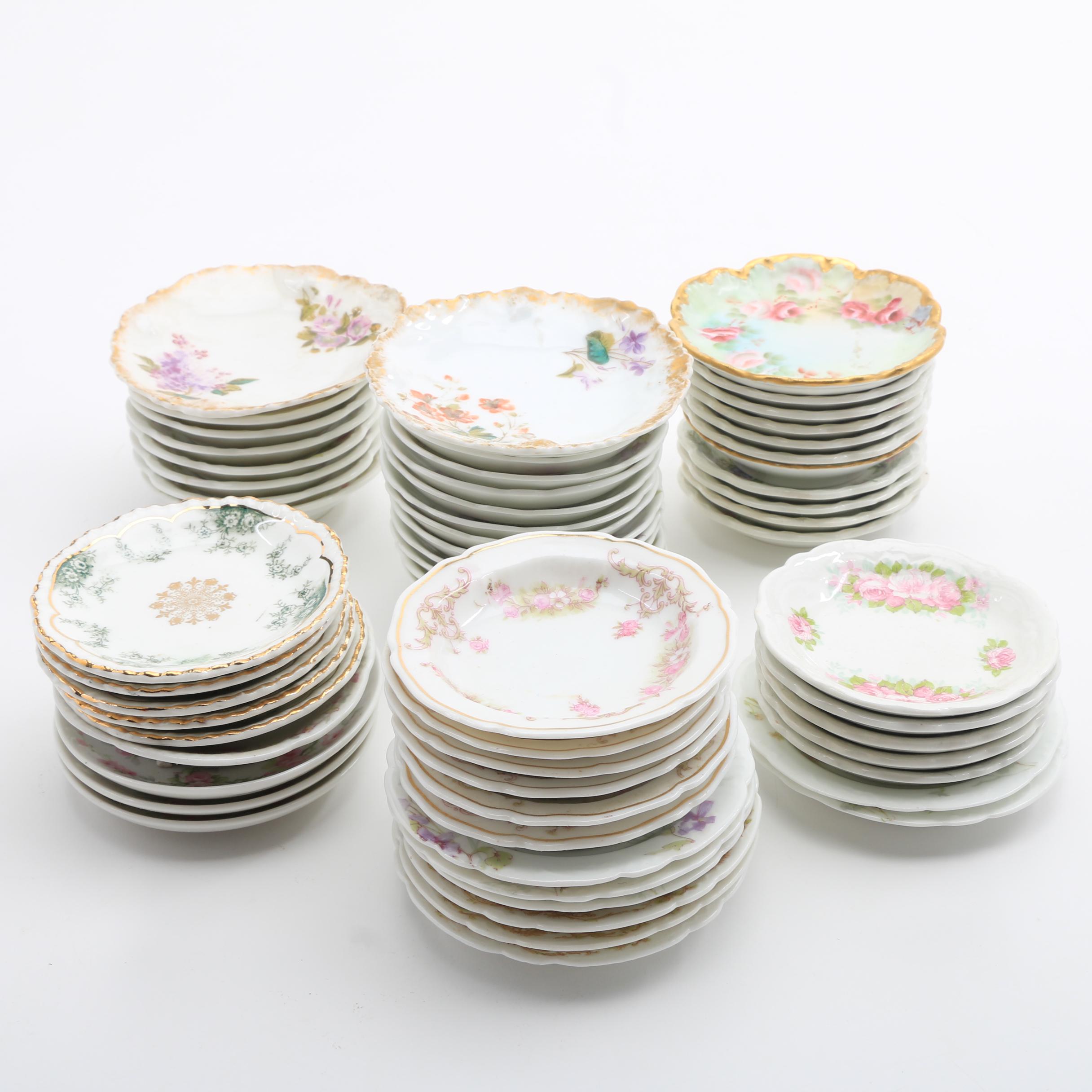 A Collection Of Over 50 Butter Pats