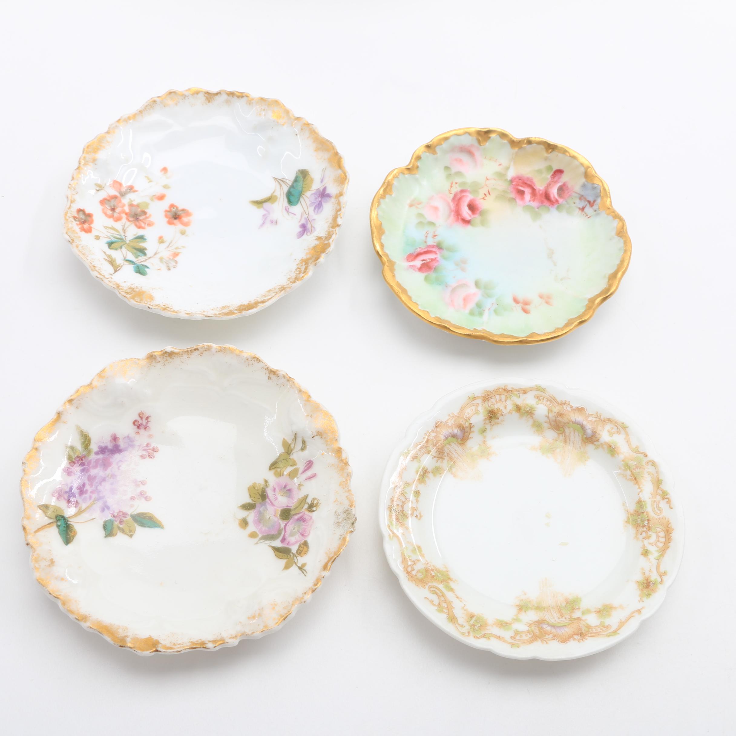 A Collection Of Over 50 Butter Pats