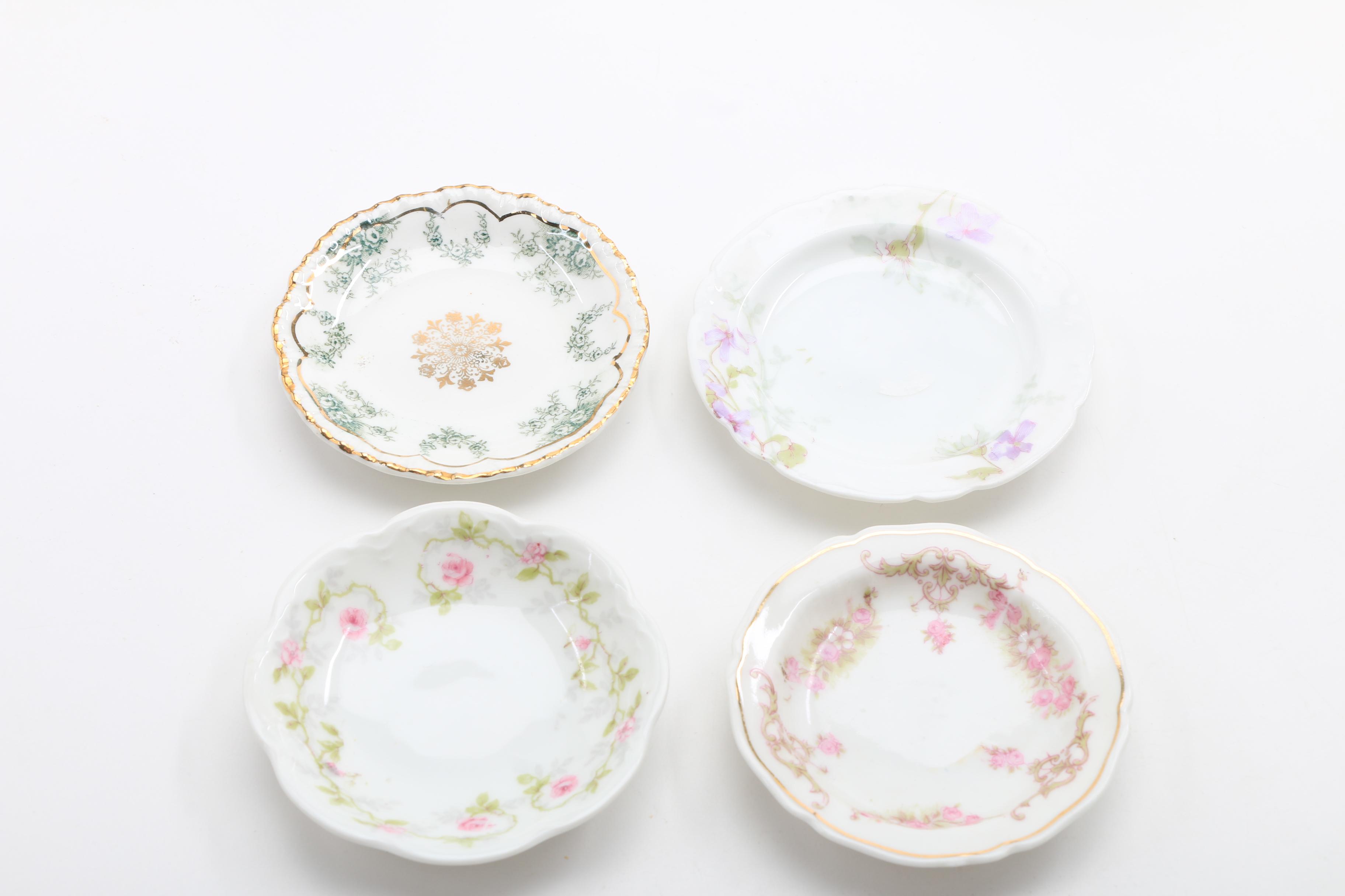 A Collection Of Over 50 Butter Pats