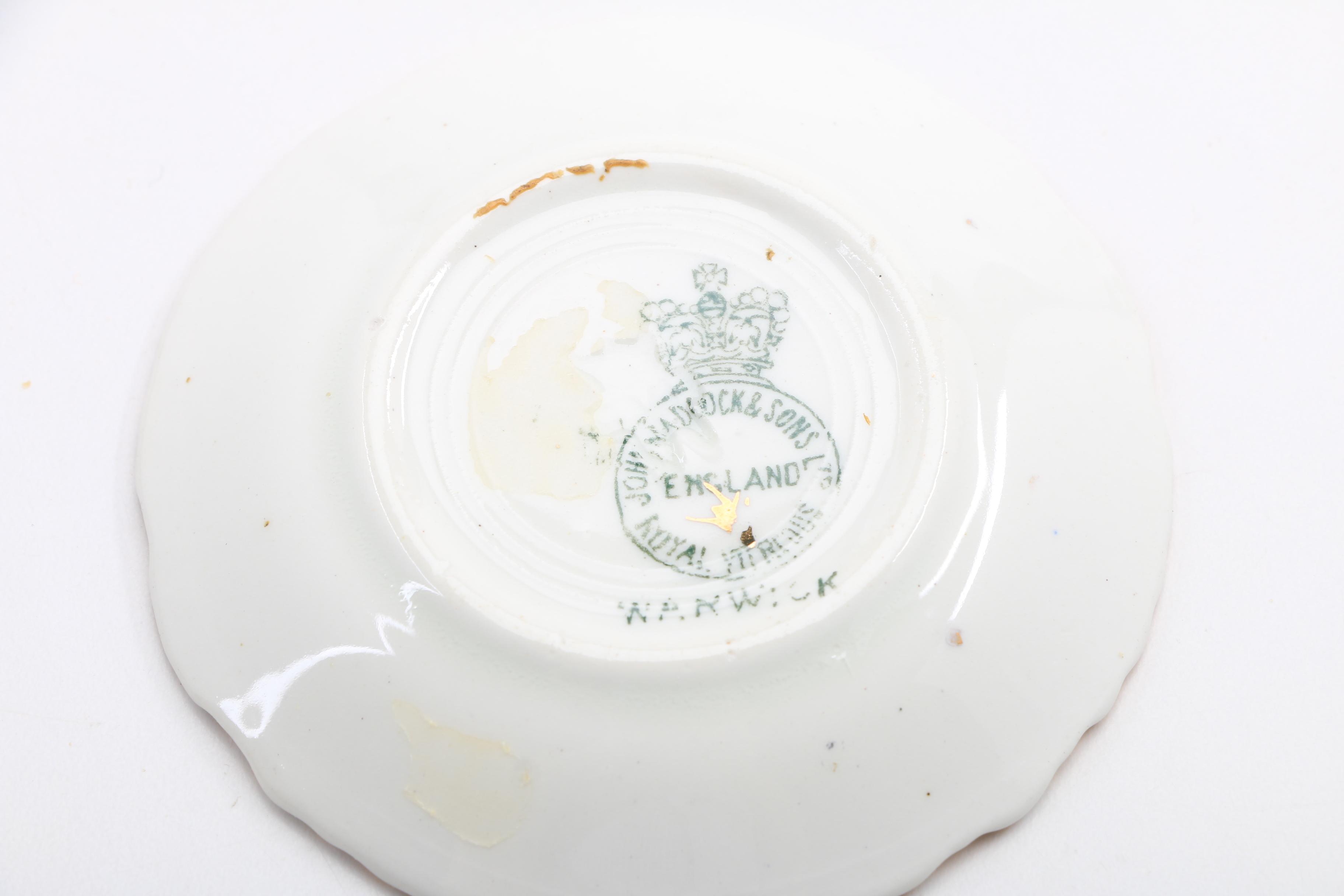 A Collection Of Over 50 Butter Pats