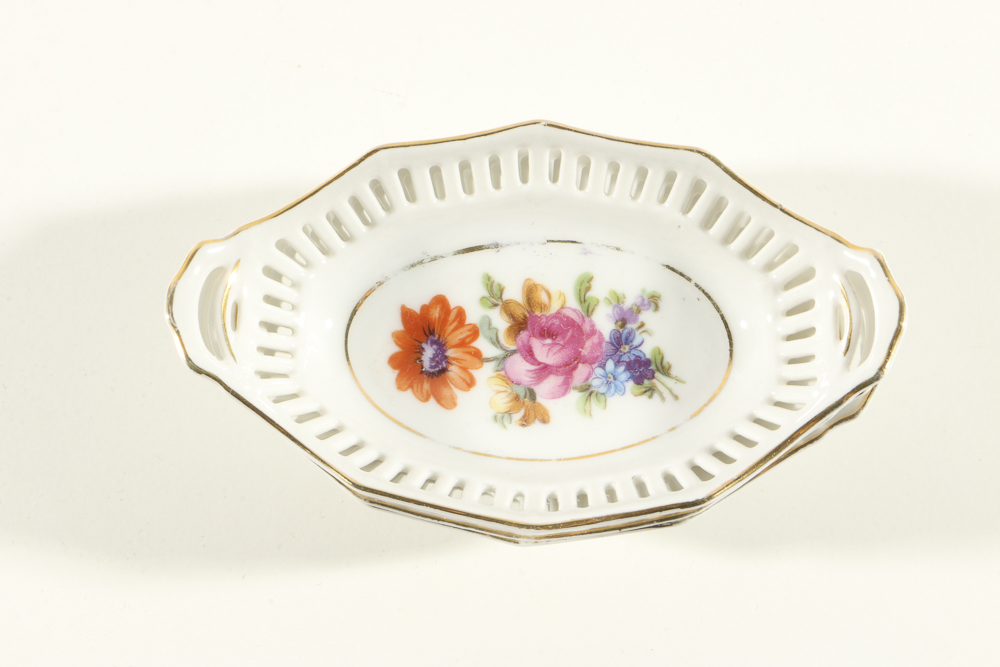 Plethora of Pierced Porcelain Plates and Bowls from Schumann