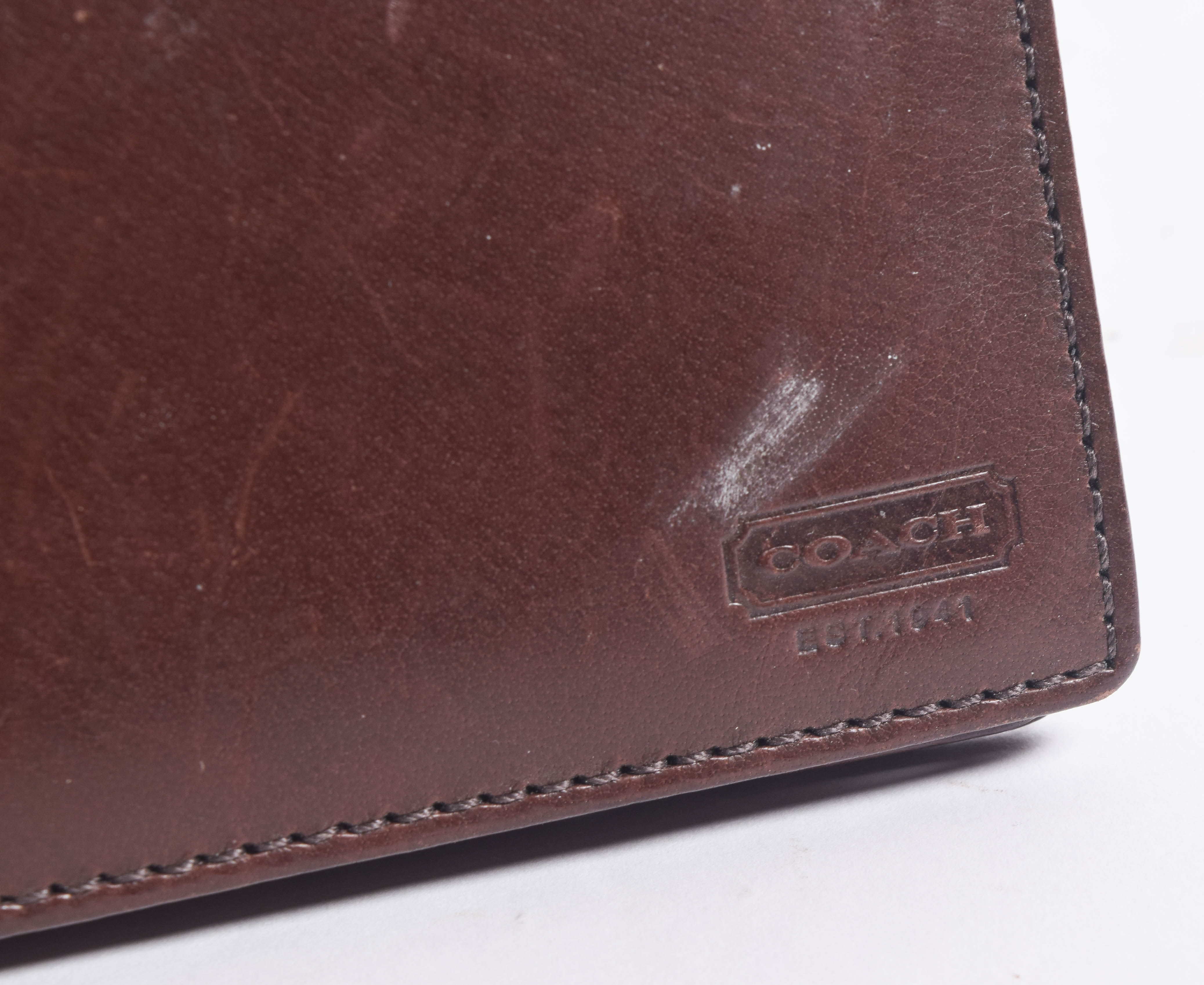 Assortment of Men's Coach Wallets and Money Clips