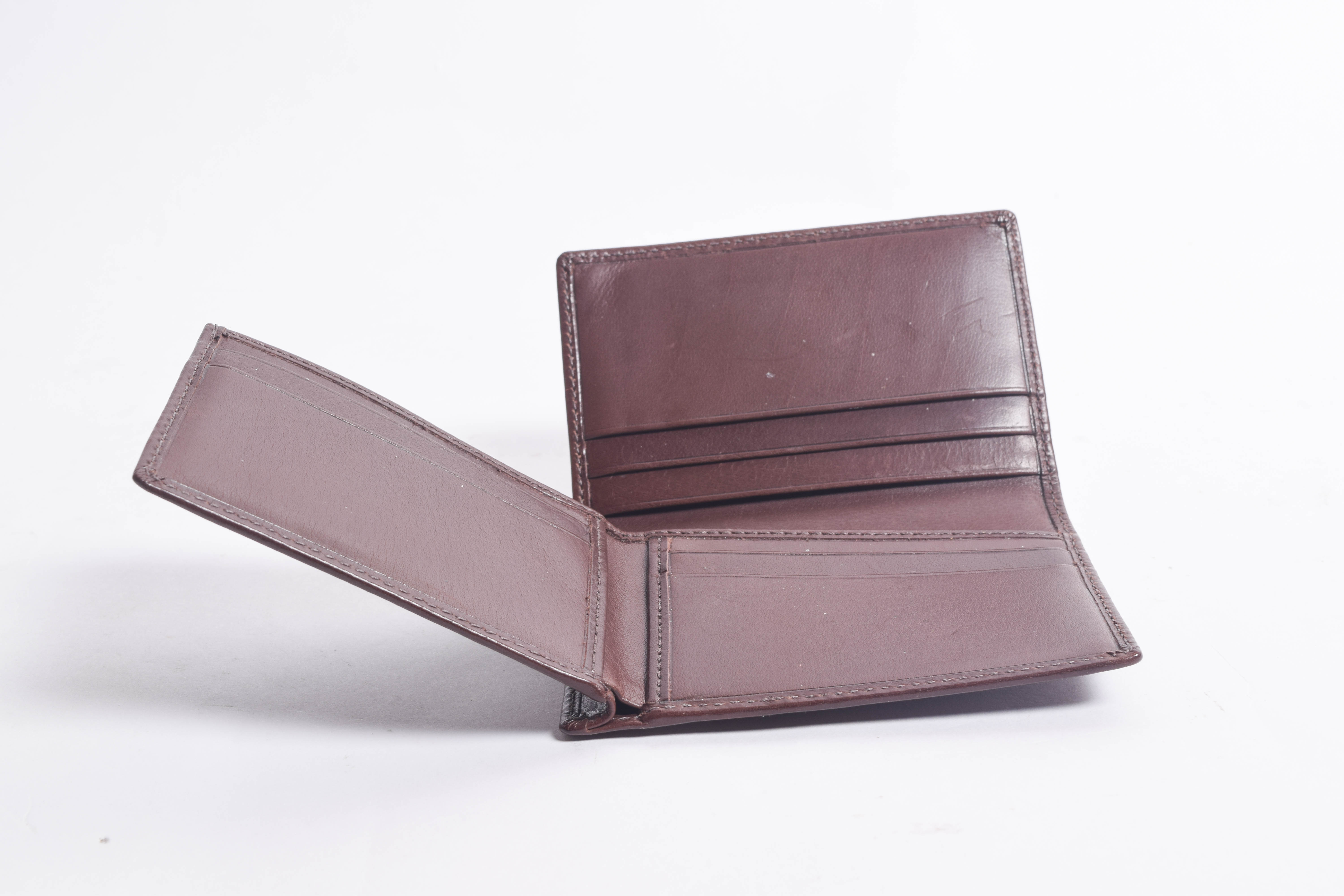 Assortment of Men's Coach Wallets and Money Clips