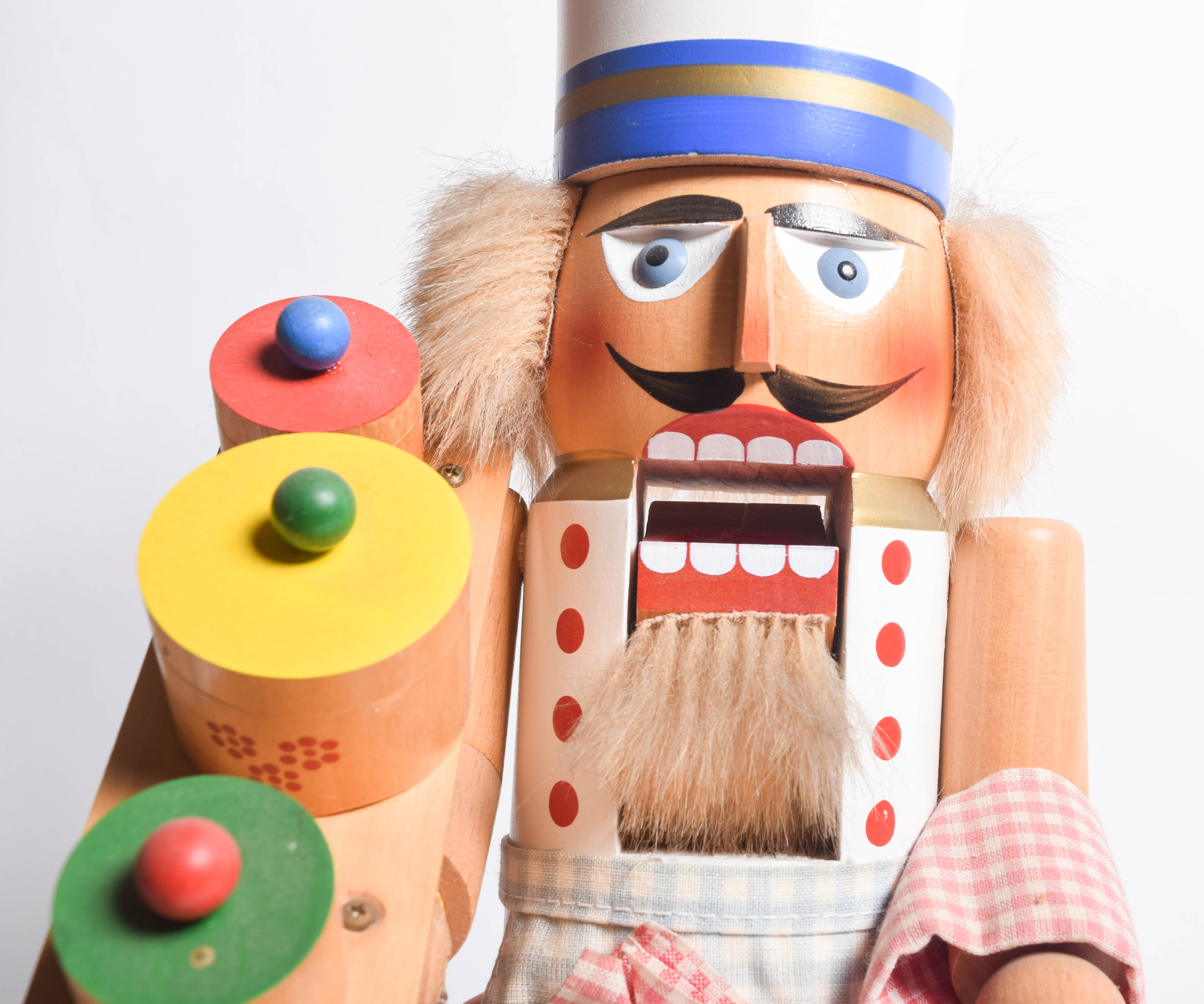 Vintage Steinbach Nutcracker and Folk Art Doll