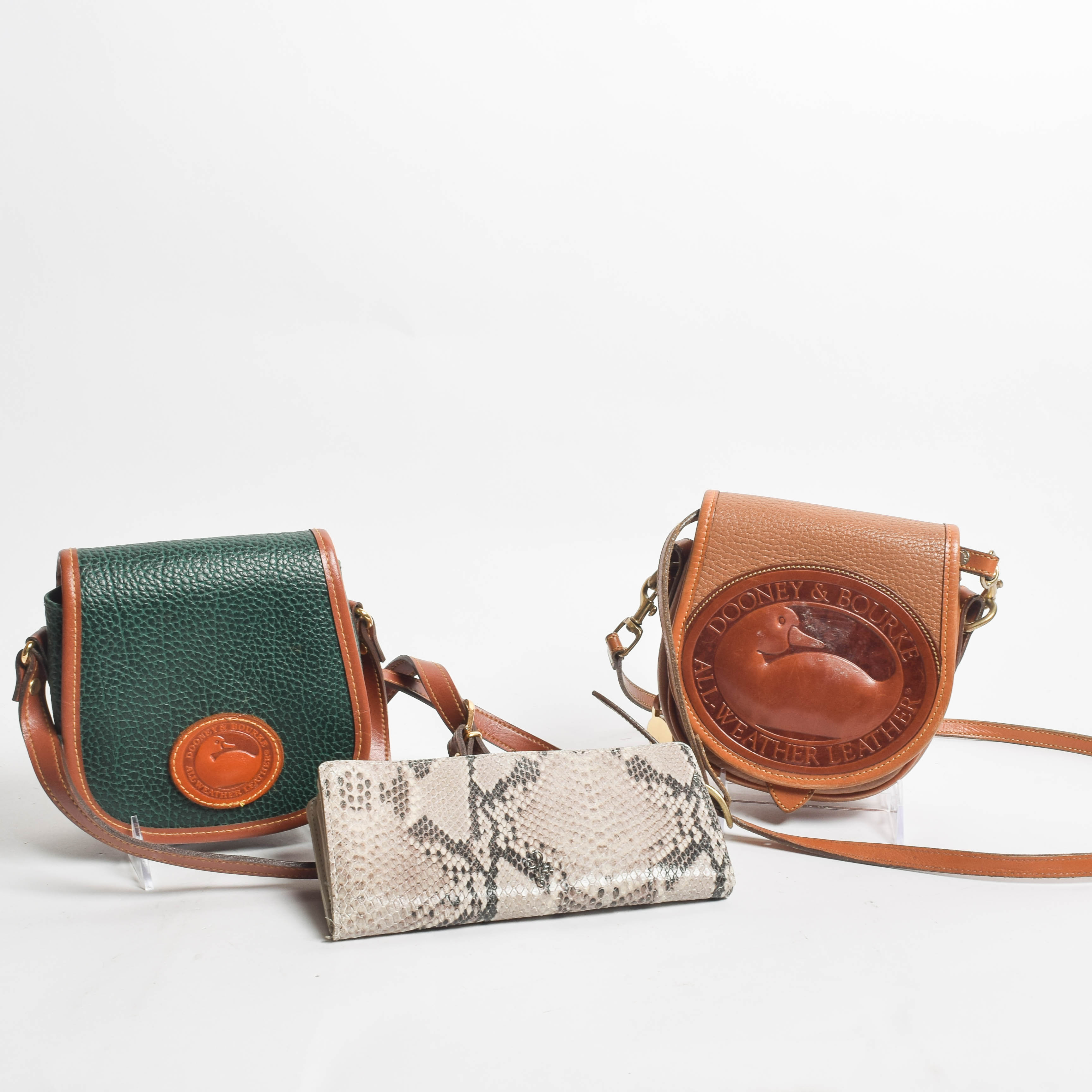 Assortment of Dooney & Bourke Handbags and Cole Haan Wallet