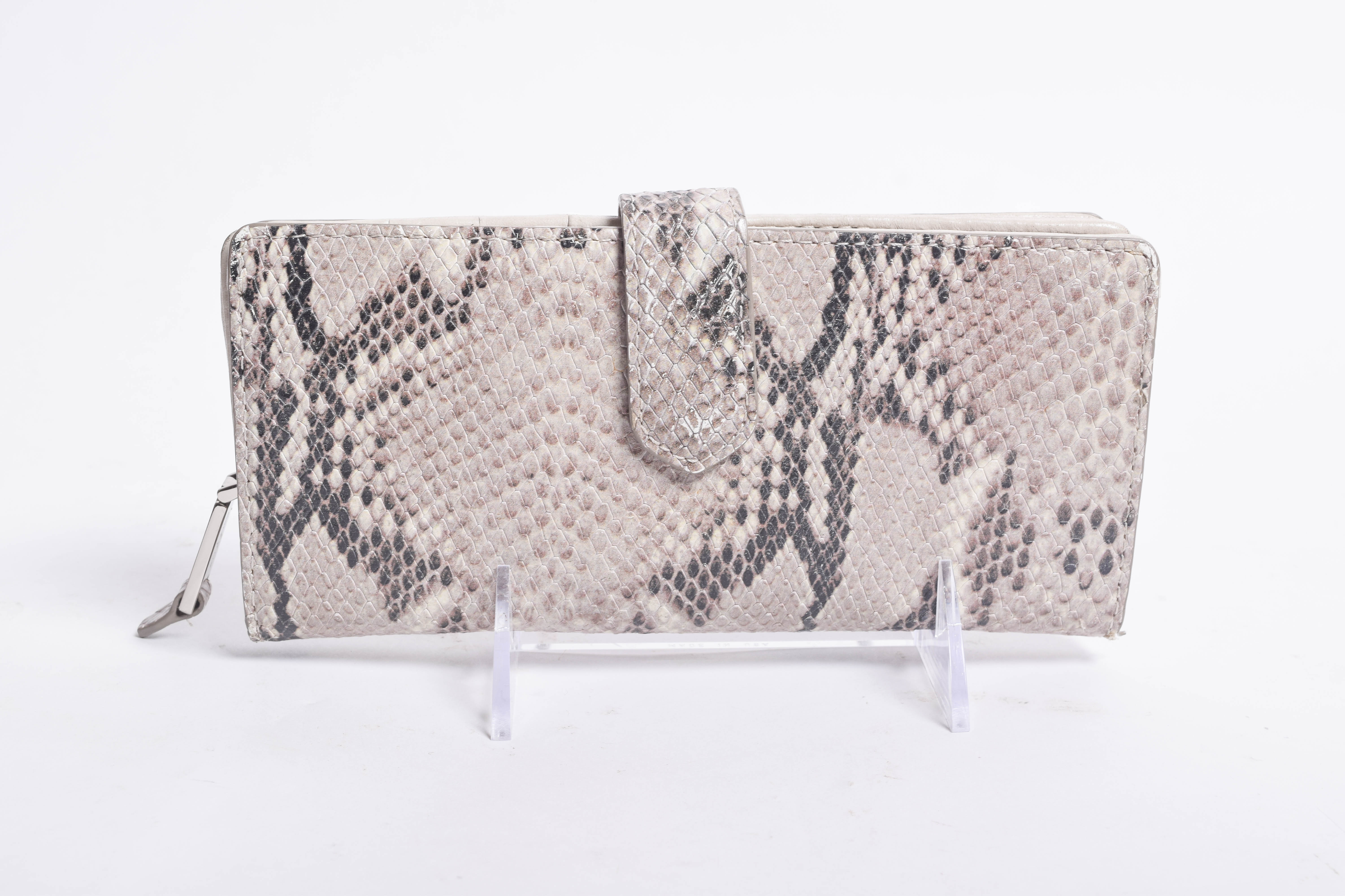 Assortment of Dooney & Bourke Handbags and Cole Haan Wallet