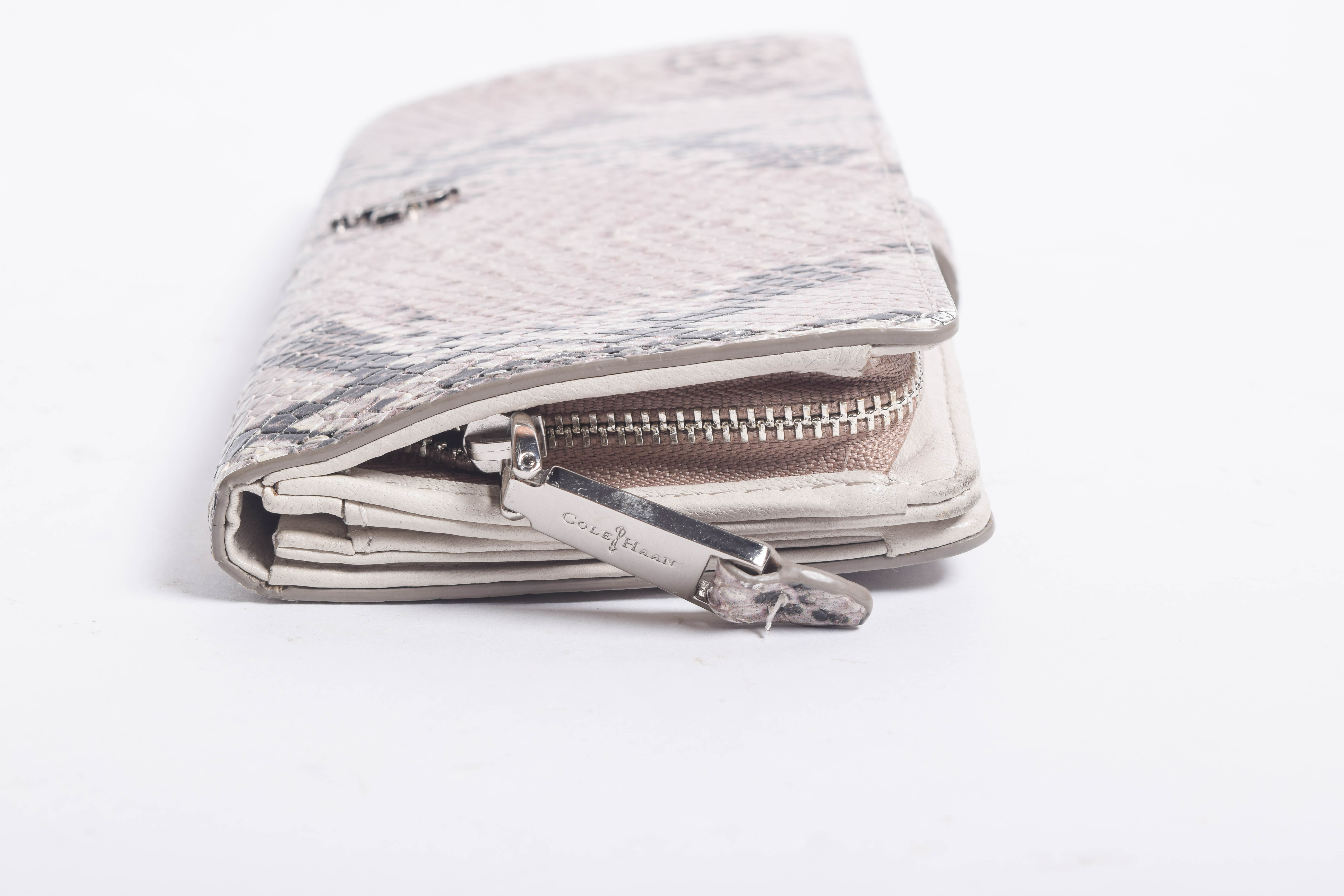 Assortment of Dooney & Bourke Handbags and Cole Haan Wallet