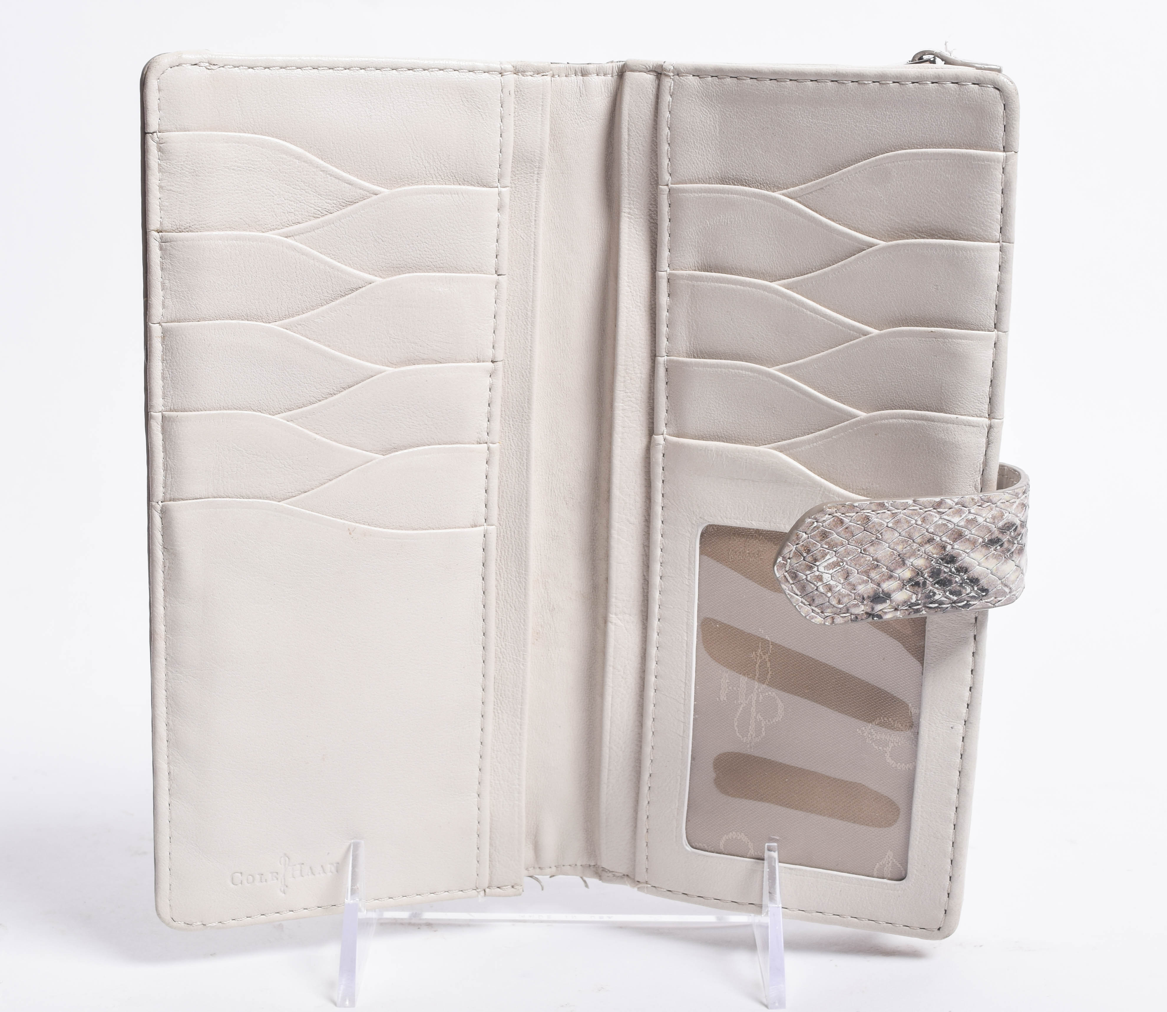 Assortment of Dooney & Bourke Handbags and Cole Haan Wallet