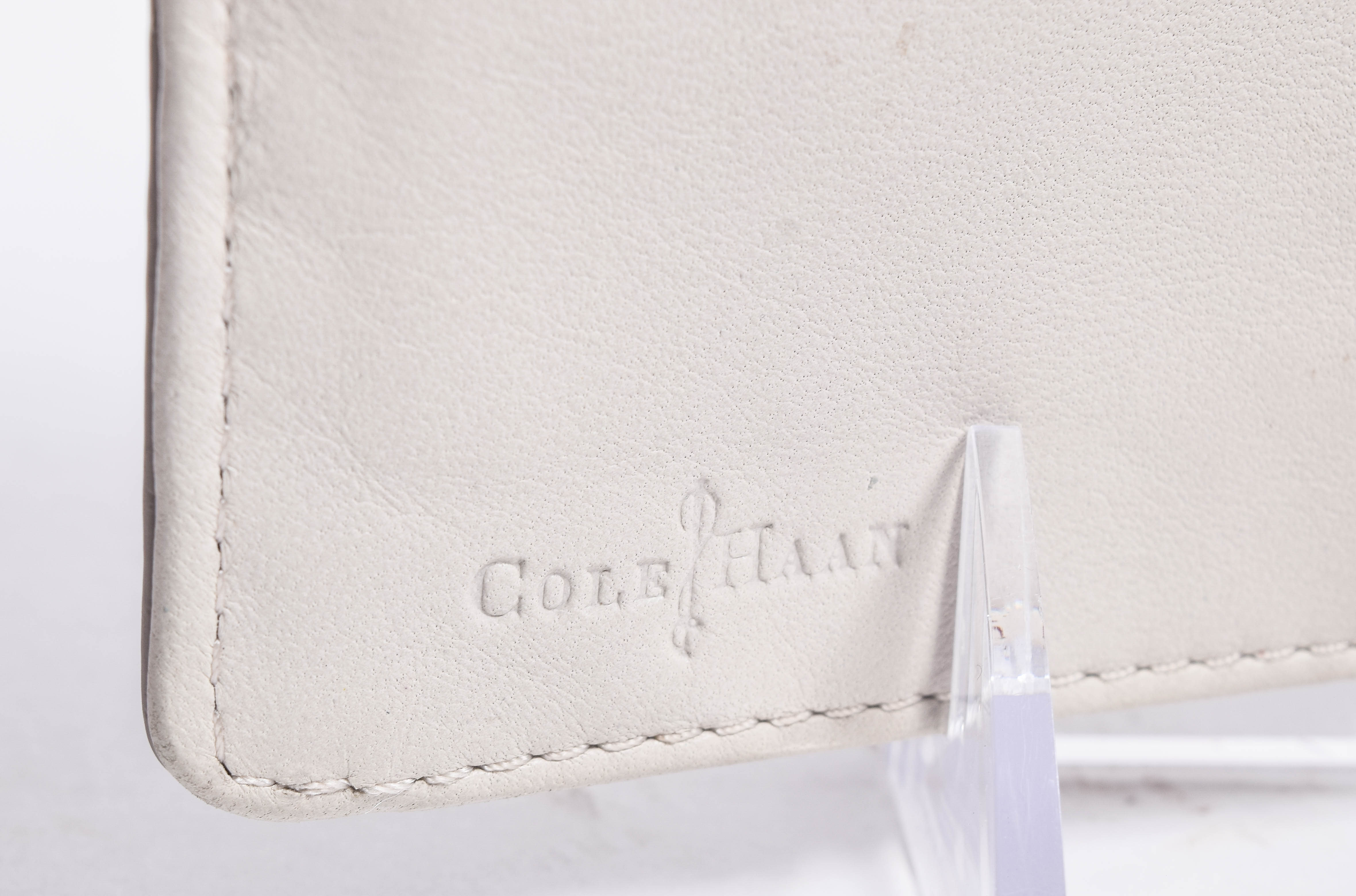 Assortment of Dooney & Bourke Handbags and Cole Haan Wallet