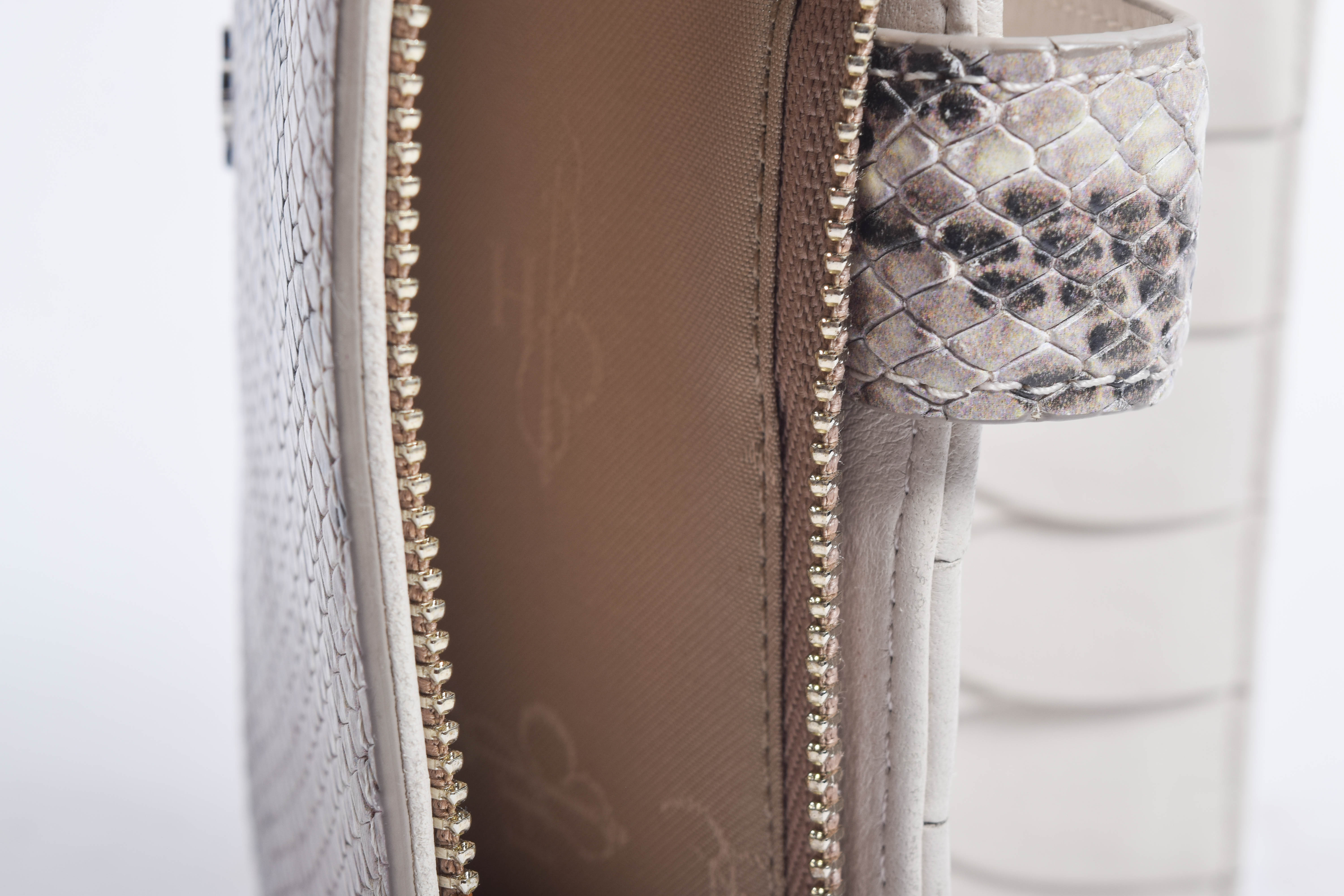 Assortment of Dooney & Bourke Handbags and Cole Haan Wallet