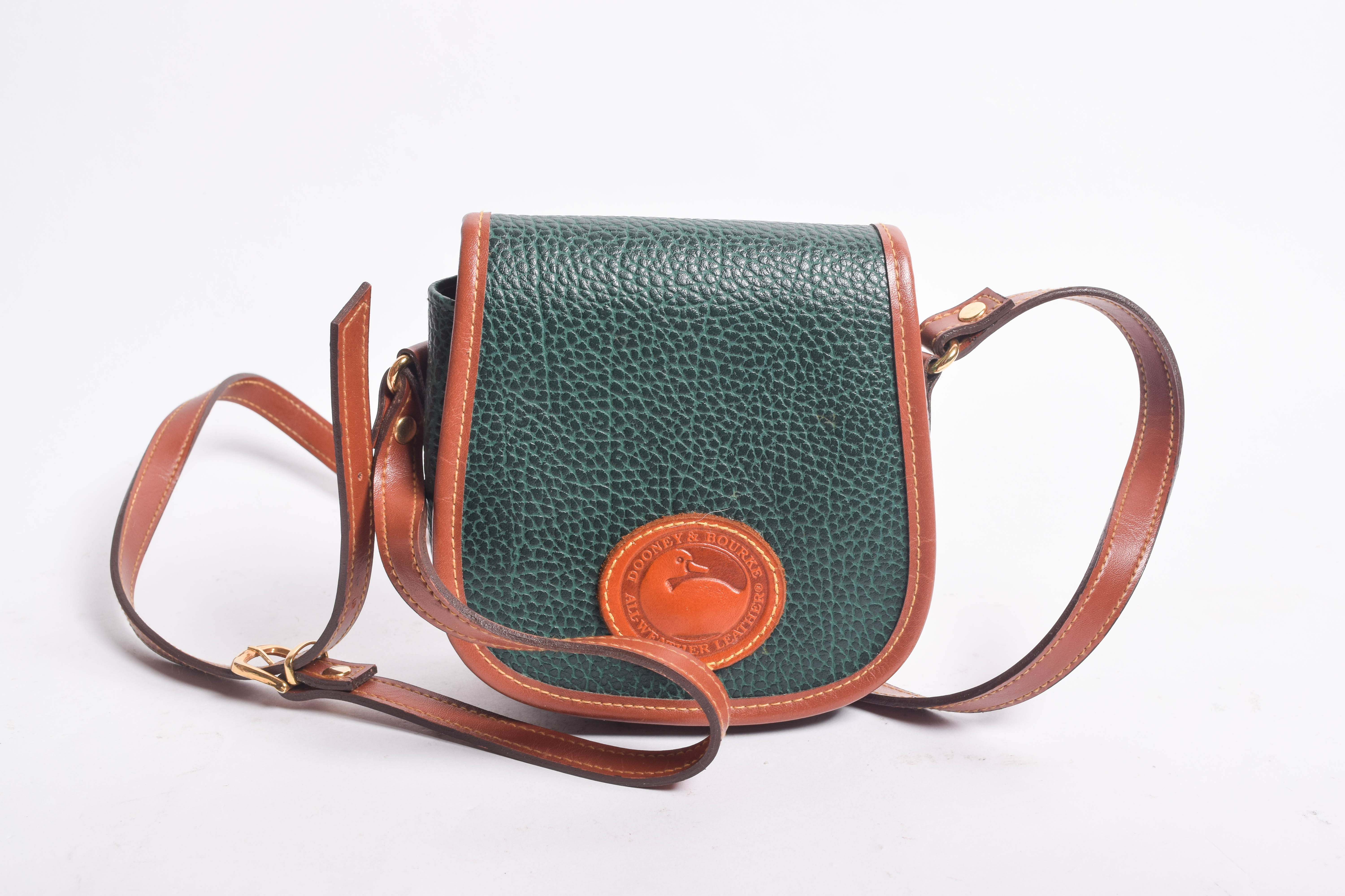 Assortment of Dooney & Bourke Handbags and Cole Haan Wallet