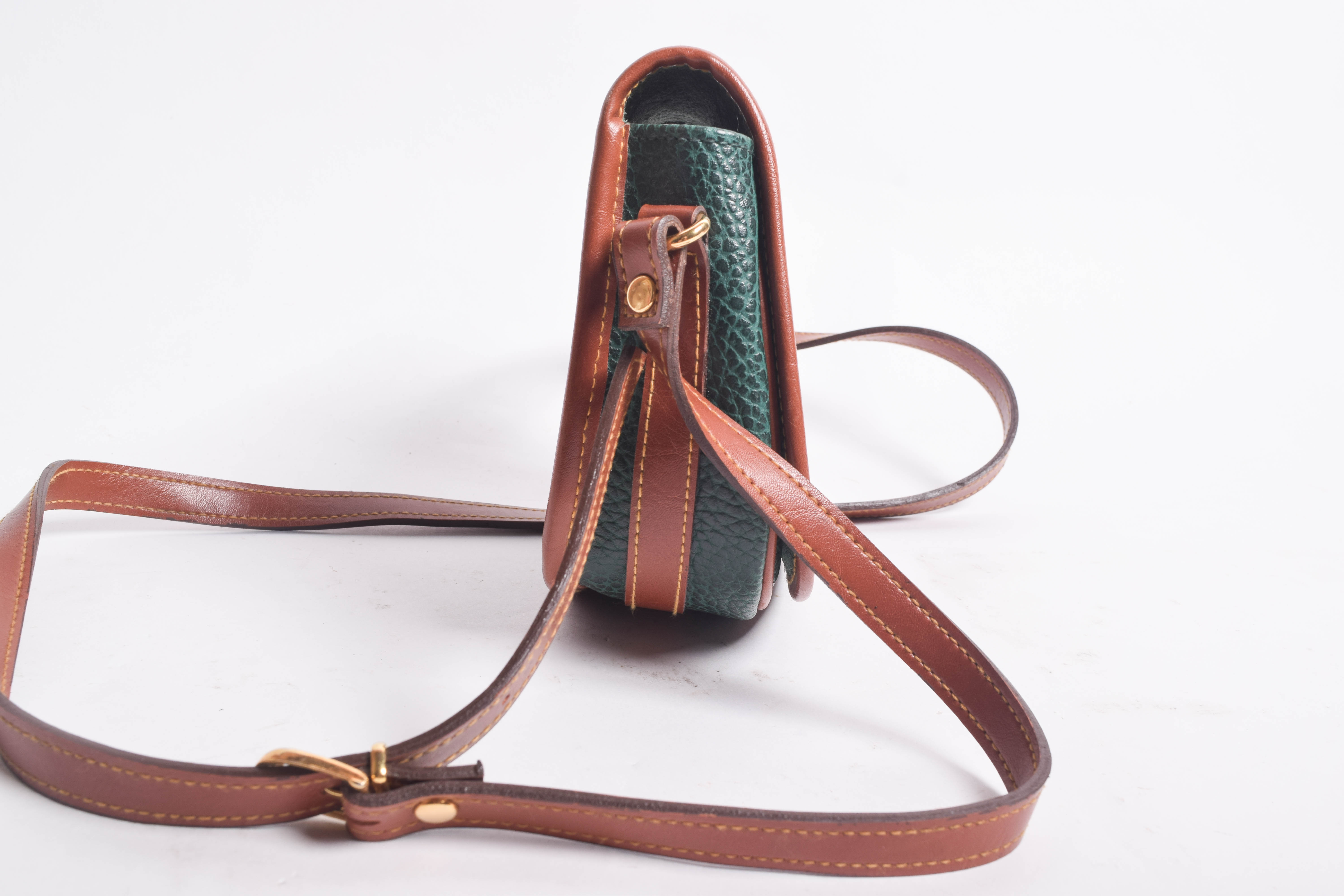 Assortment of Dooney & Bourke Handbags and Cole Haan Wallet