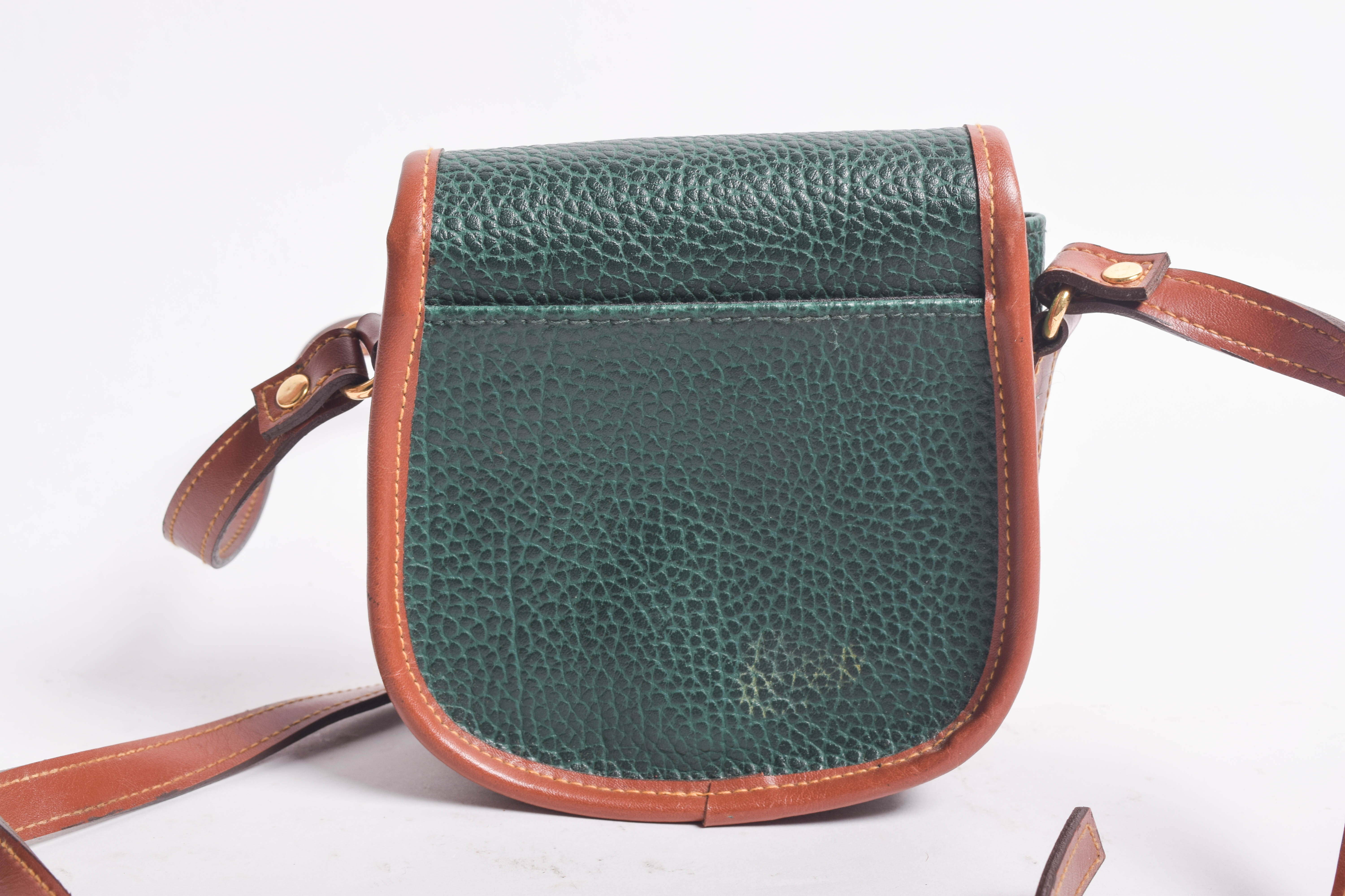 Assortment of Dooney & Bourke Handbags and Cole Haan Wallet