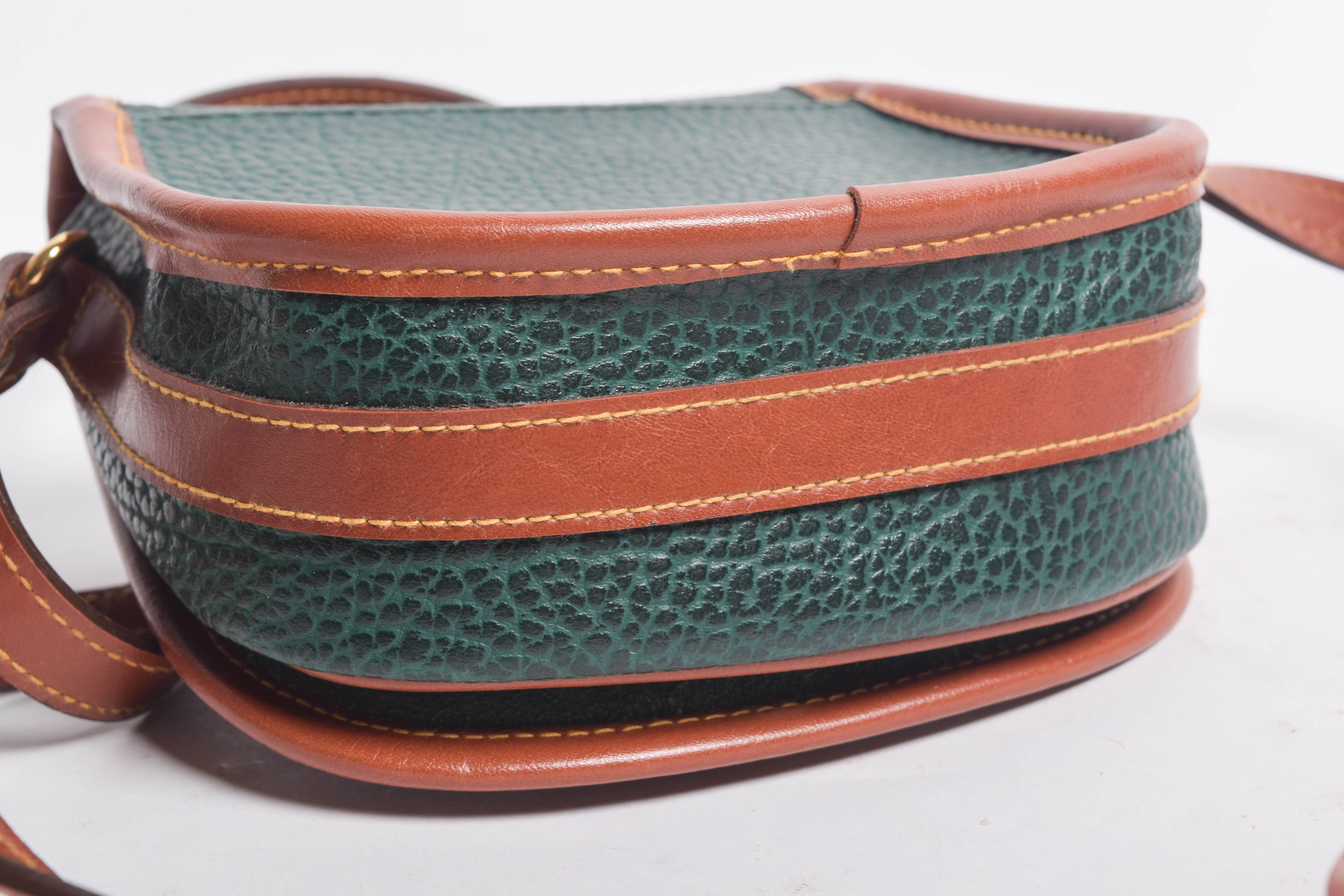 Assortment of Dooney & Bourke Handbags and Cole Haan Wallet