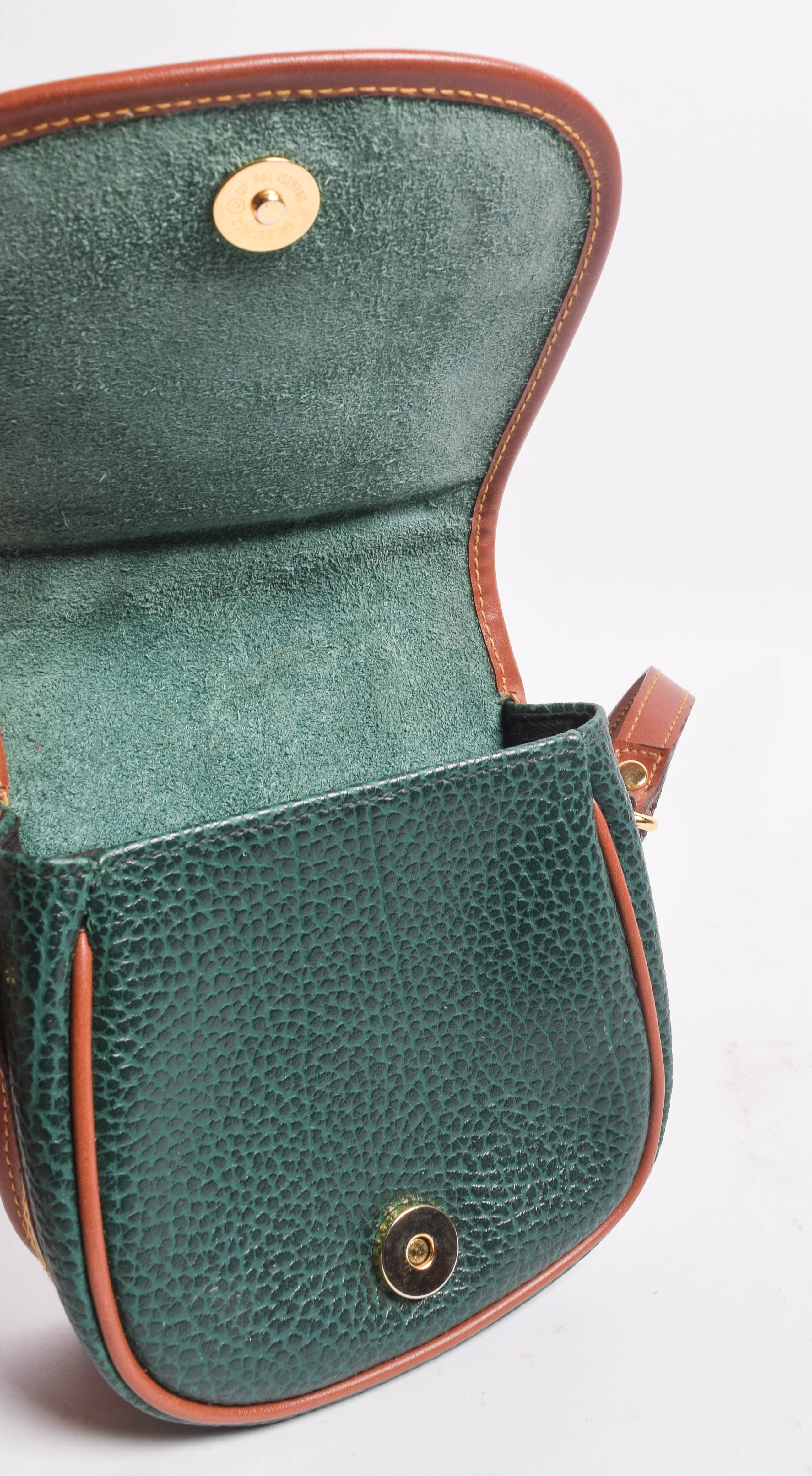 Assortment of Dooney & Bourke Handbags and Cole Haan Wallet