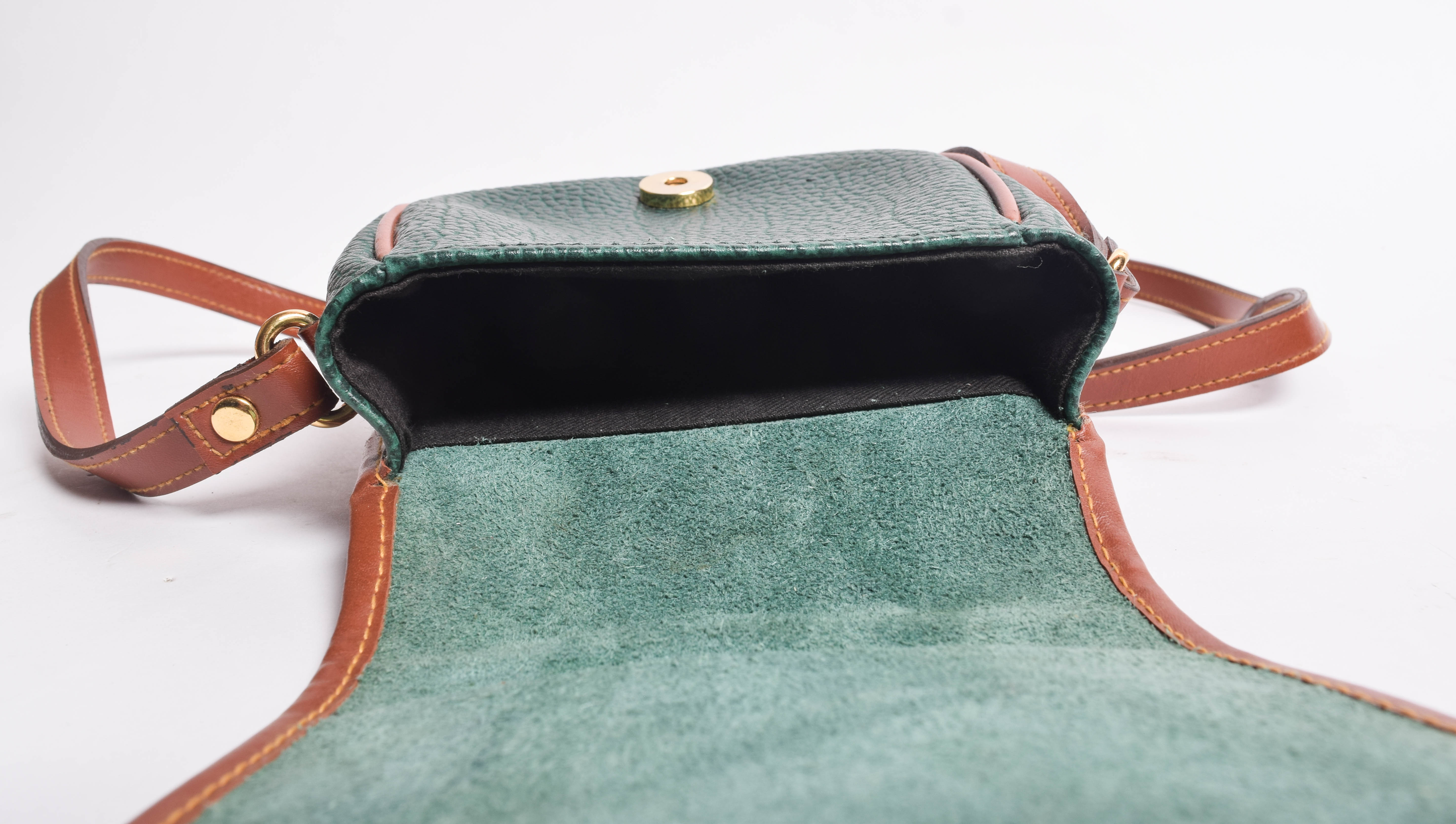 Assortment of Dooney & Bourke Handbags and Cole Haan Wallet