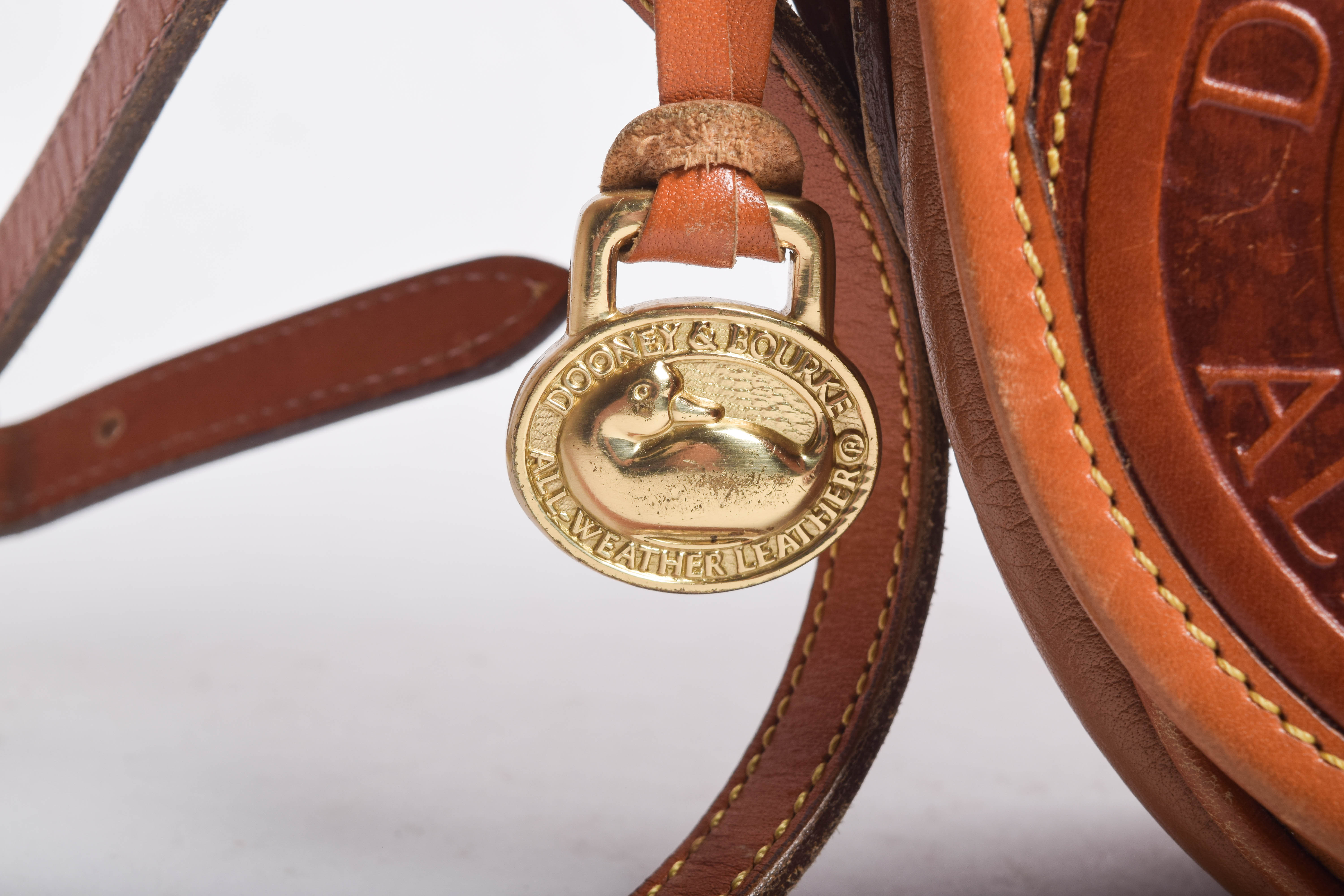 Assortment of Dooney & Bourke Handbags and Cole Haan Wallet