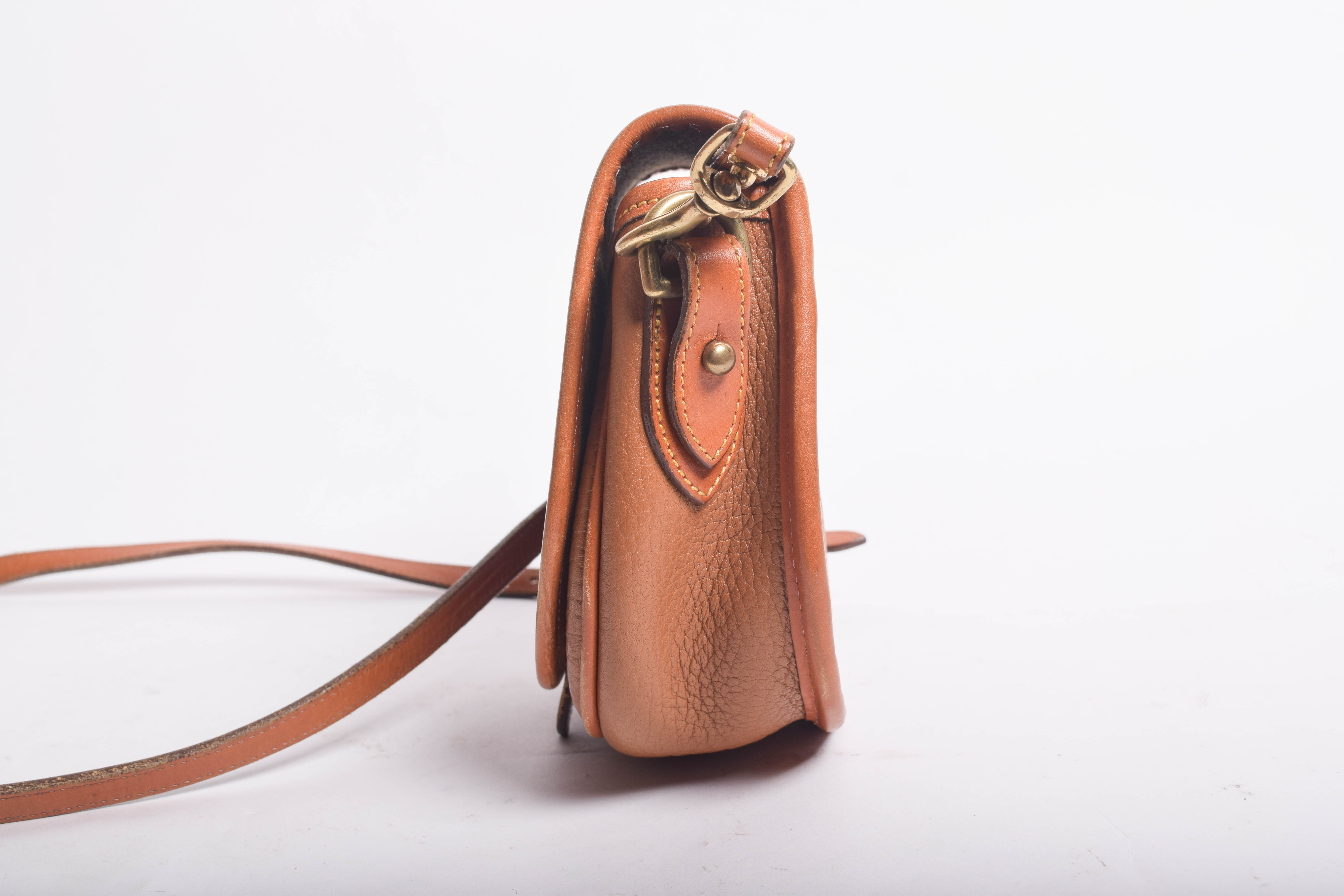 Assortment of Dooney & Bourke Handbags and Cole Haan Wallet