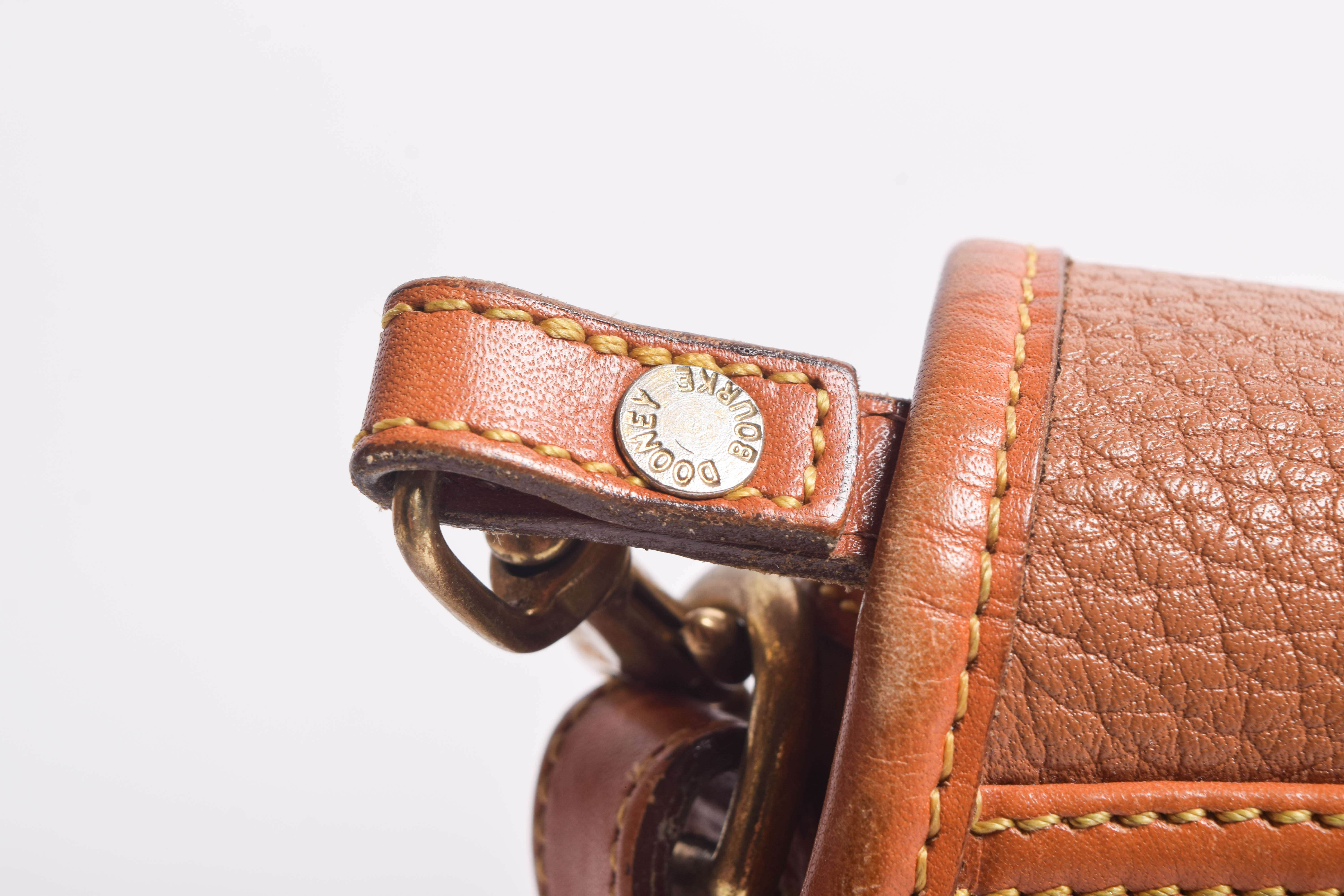 Assortment of Dooney & Bourke Handbags and Cole Haan Wallet