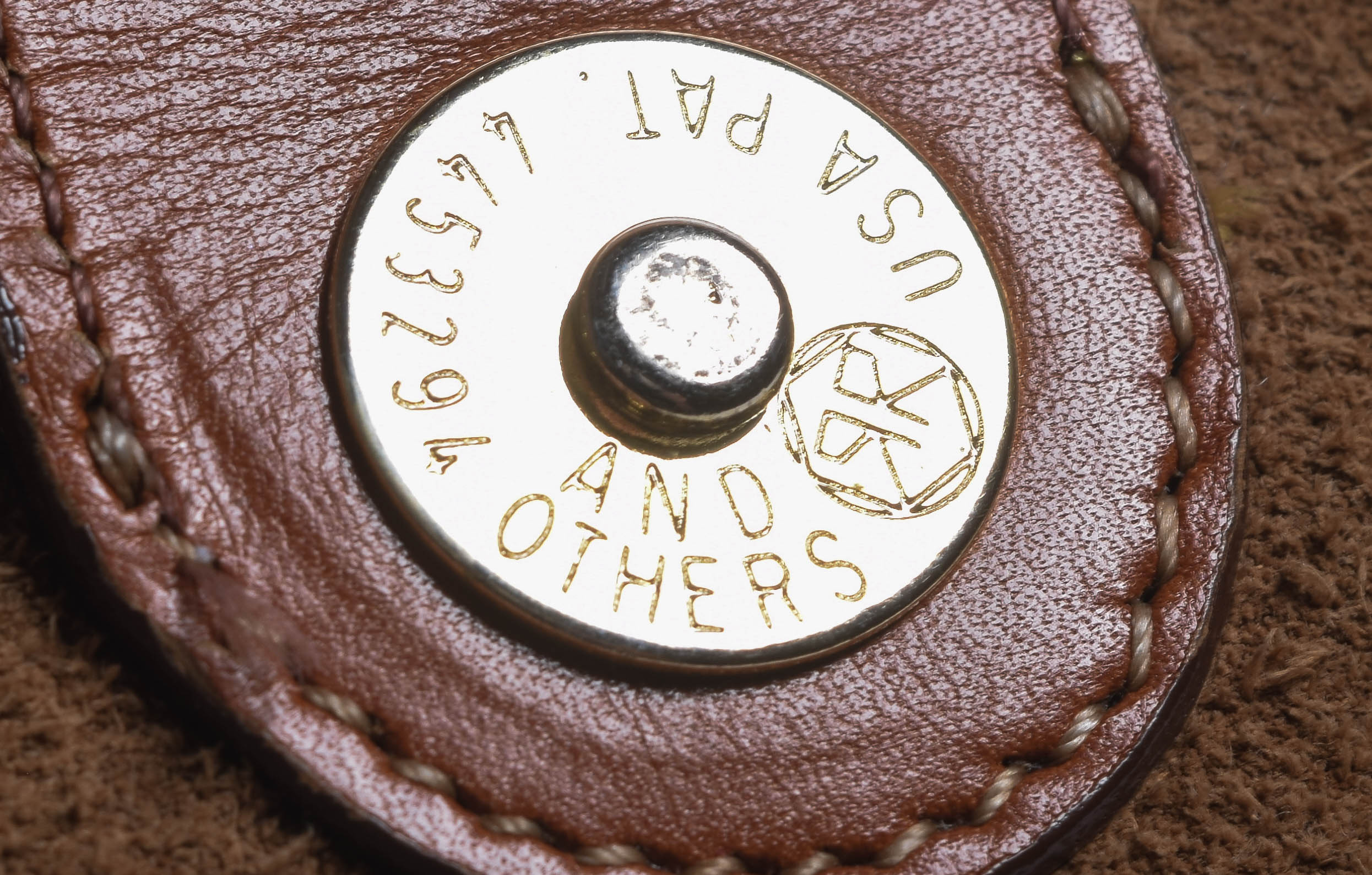 Assortment of Dooney & Bourke Handbags and Cole Haan Wallet