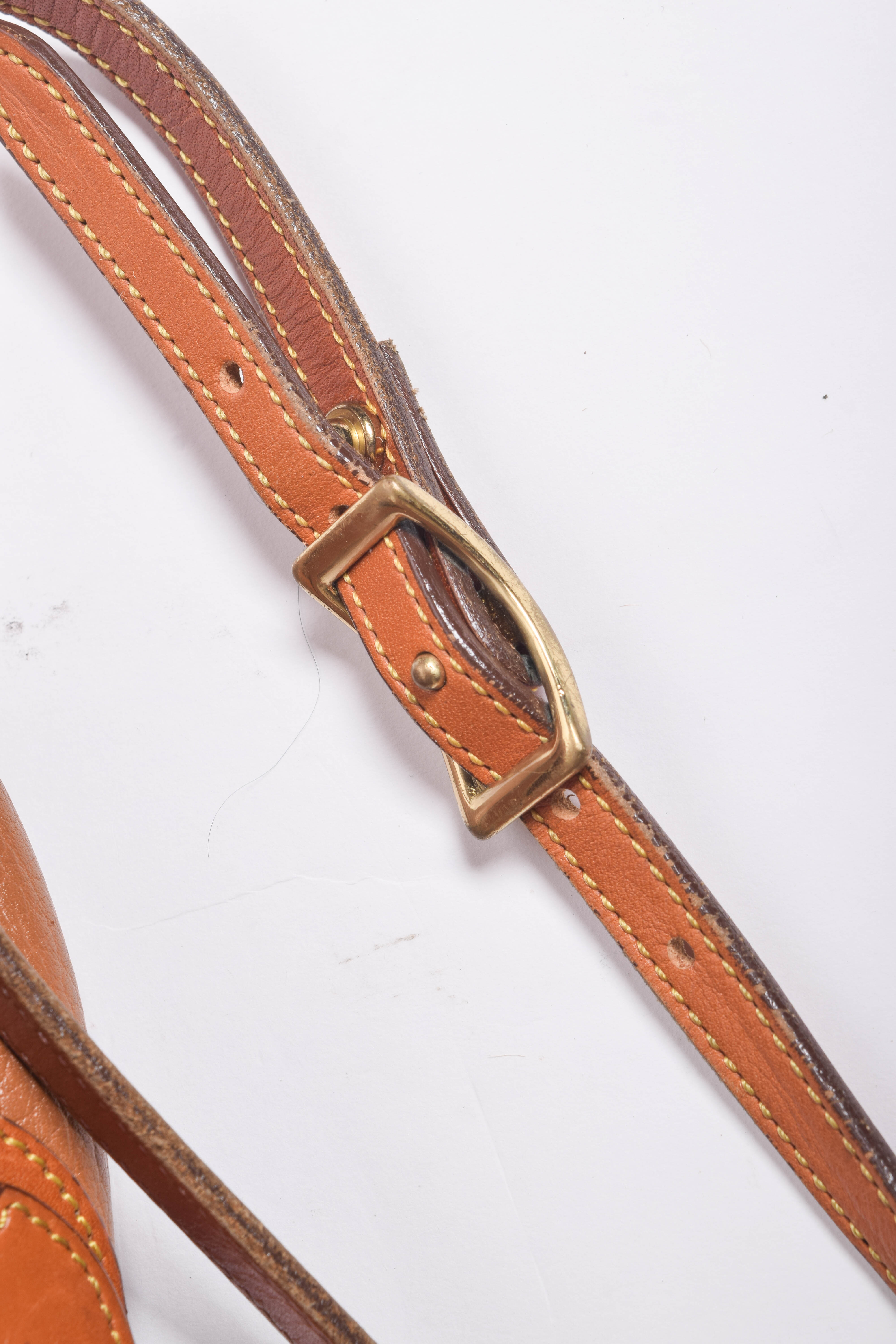 Assortment of Dooney & Bourke Handbags and Cole Haan Wallet