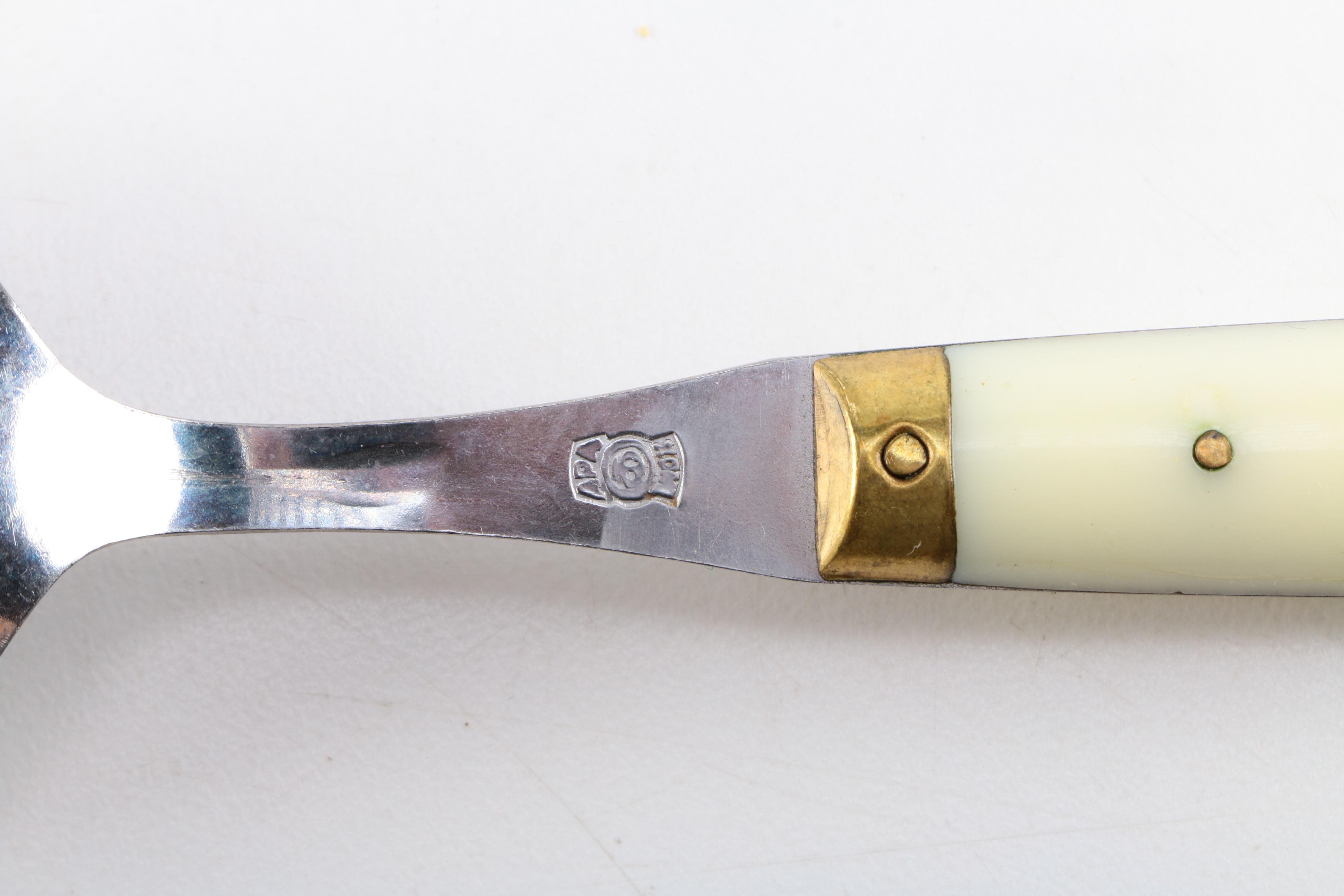 White Plastic Handled Flatware