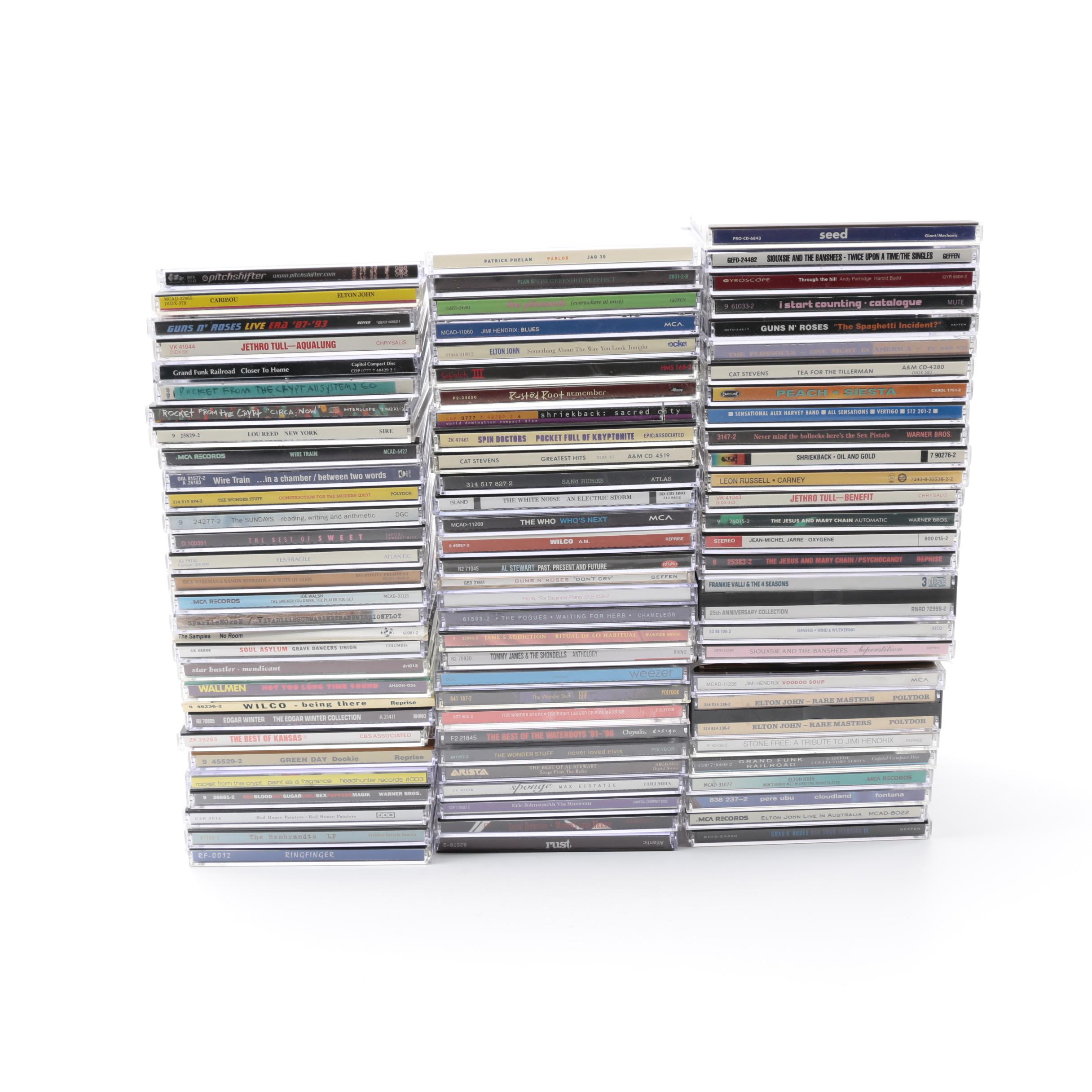 Assortment of Compact Discs including Guns N' Ros*relotted*