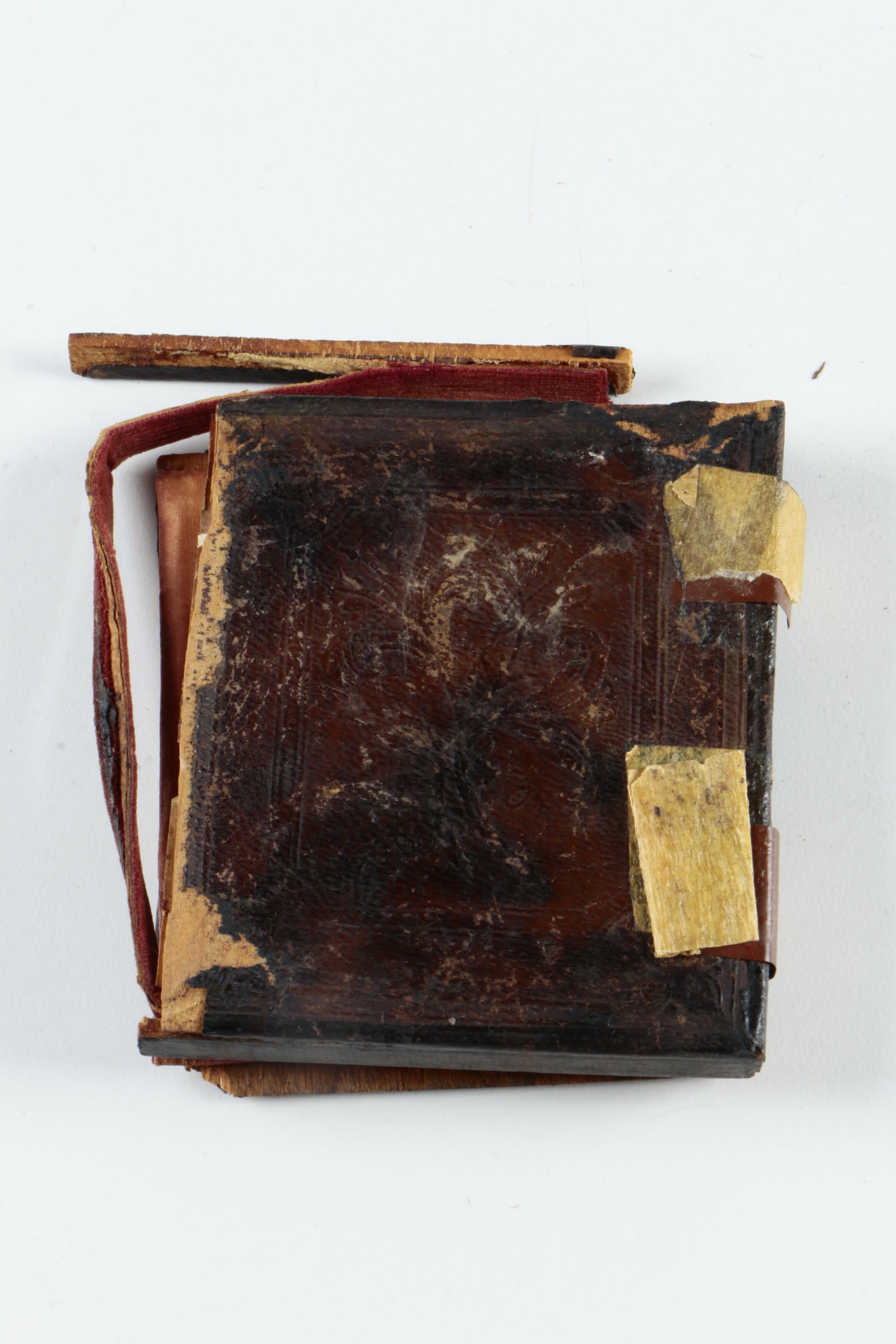 Antique Photographs of a Man and a Woman with Cases