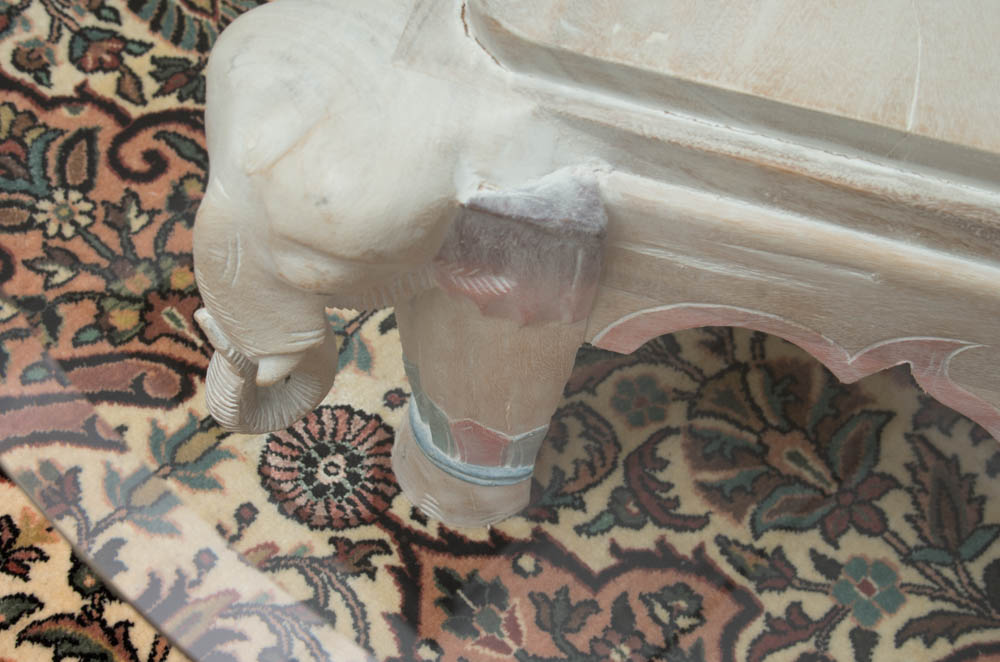 Coffee Table with Elephant Themed Base and Glass Top