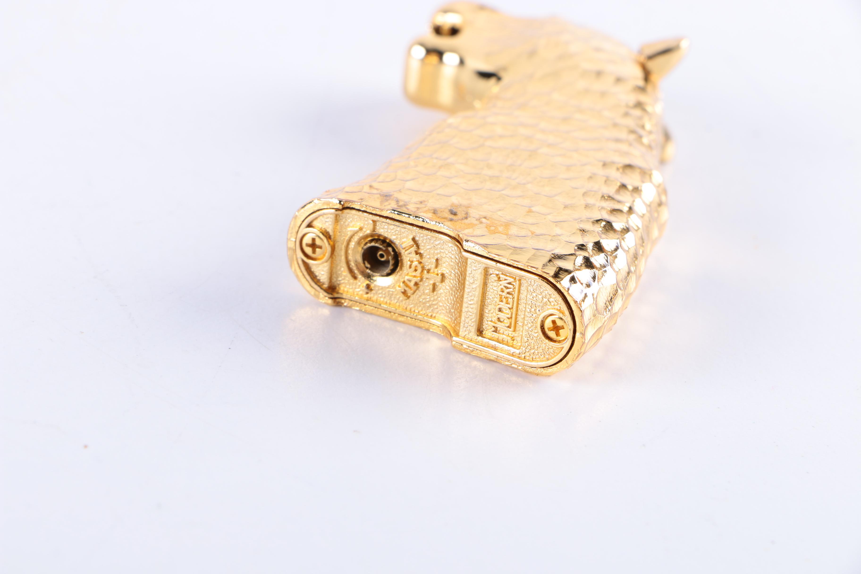 Gold-Toned Lighters Including Masai