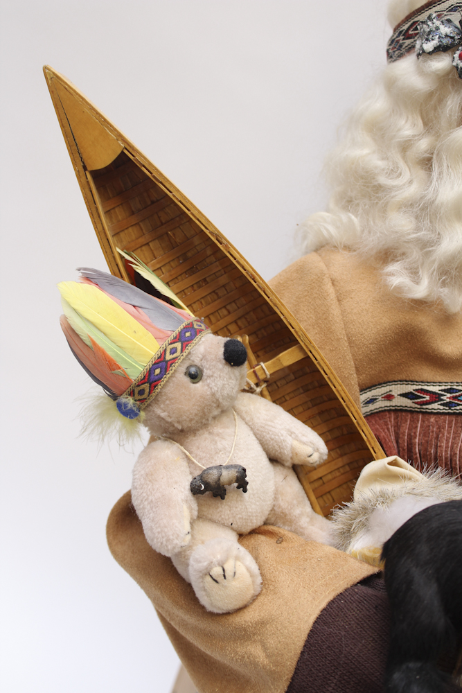 Sitting Santa with Native American Style Attire by Dee Cash