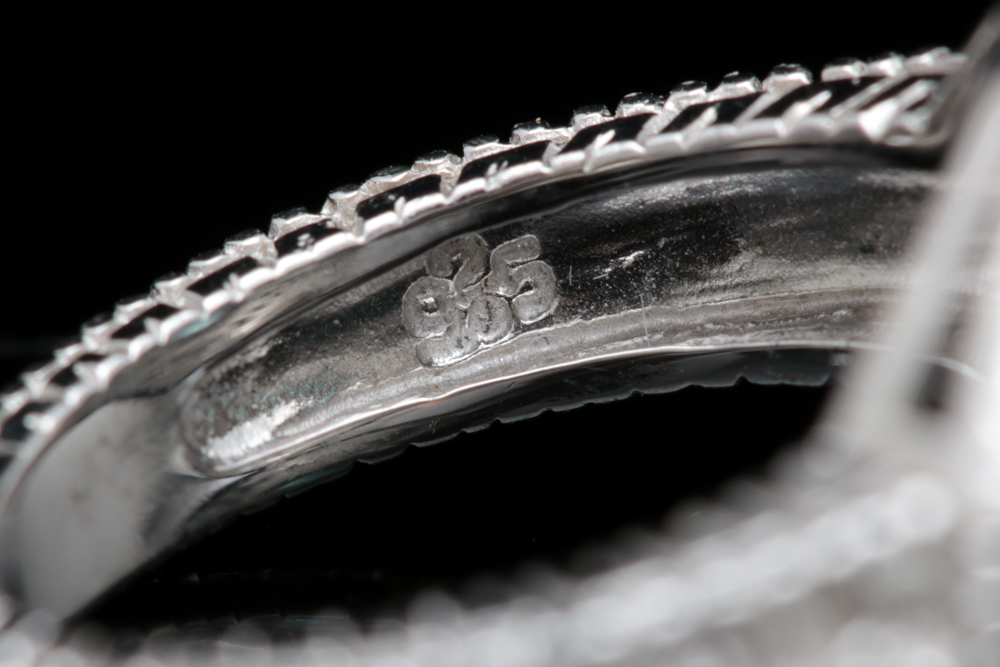 Sterling Silver Blue Zircon and Treated Diamond Ring