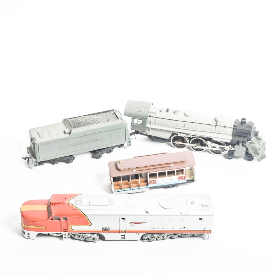 Collection of Train Engines and Trolley
