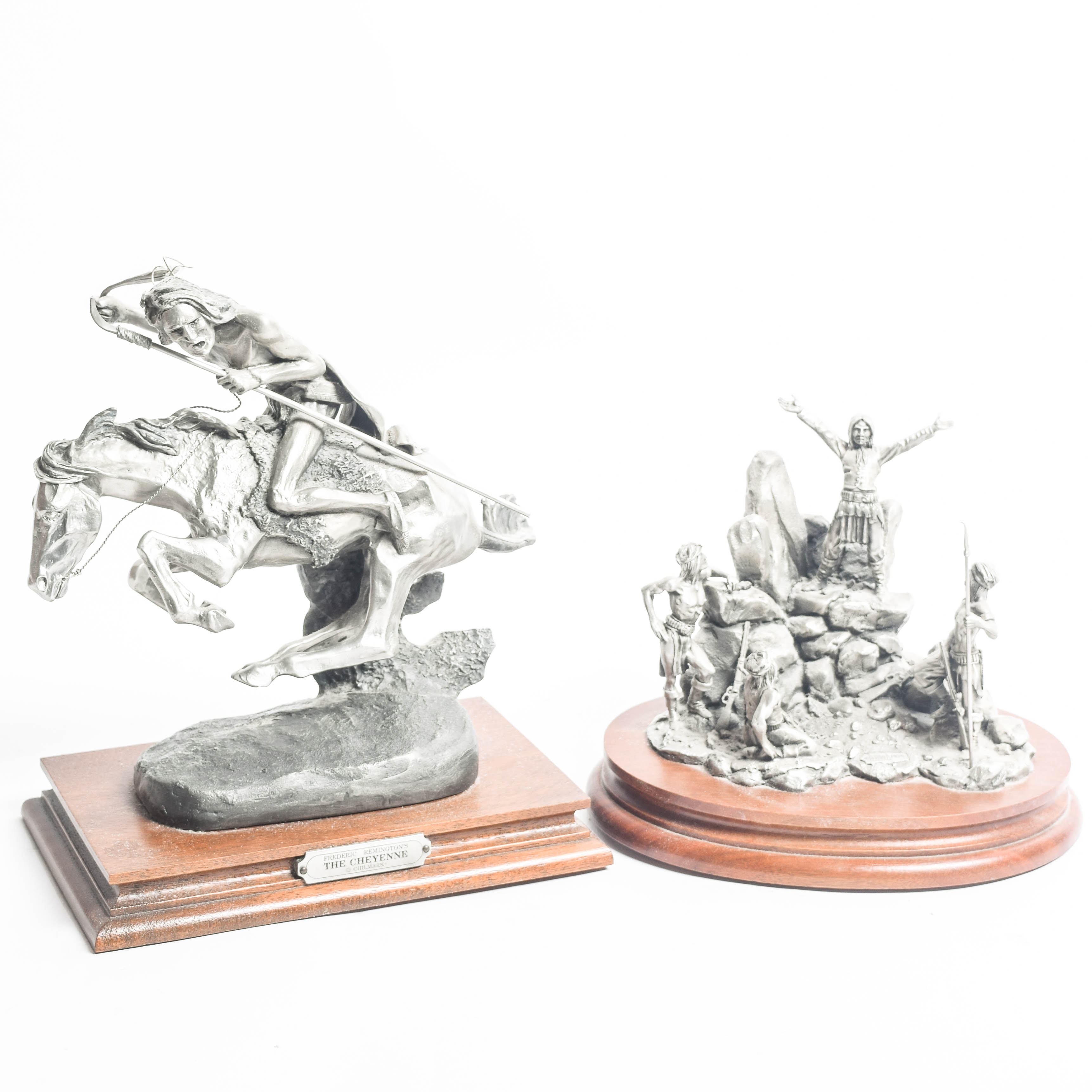 Pair of Limited Edition Polland and Remington Reproduction Pewter Sculptures