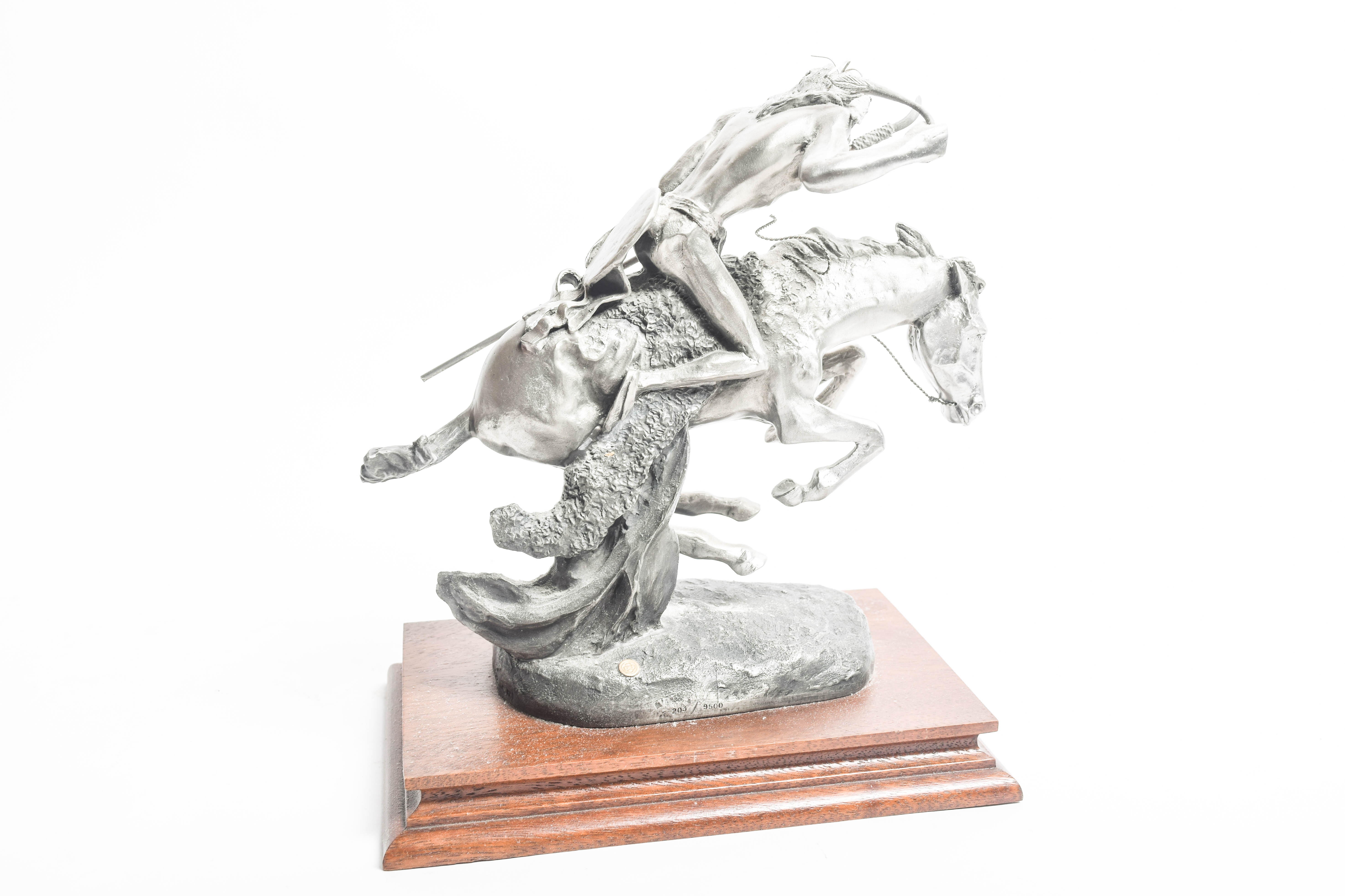 Pair of Limited Edition Polland and Remington Reproduction Pewter Sculptures