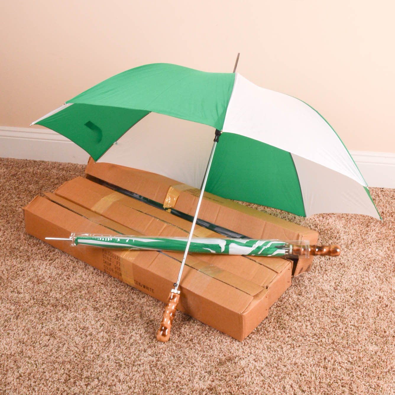 Grouping of Green and White Nylon Rain Umbrellas