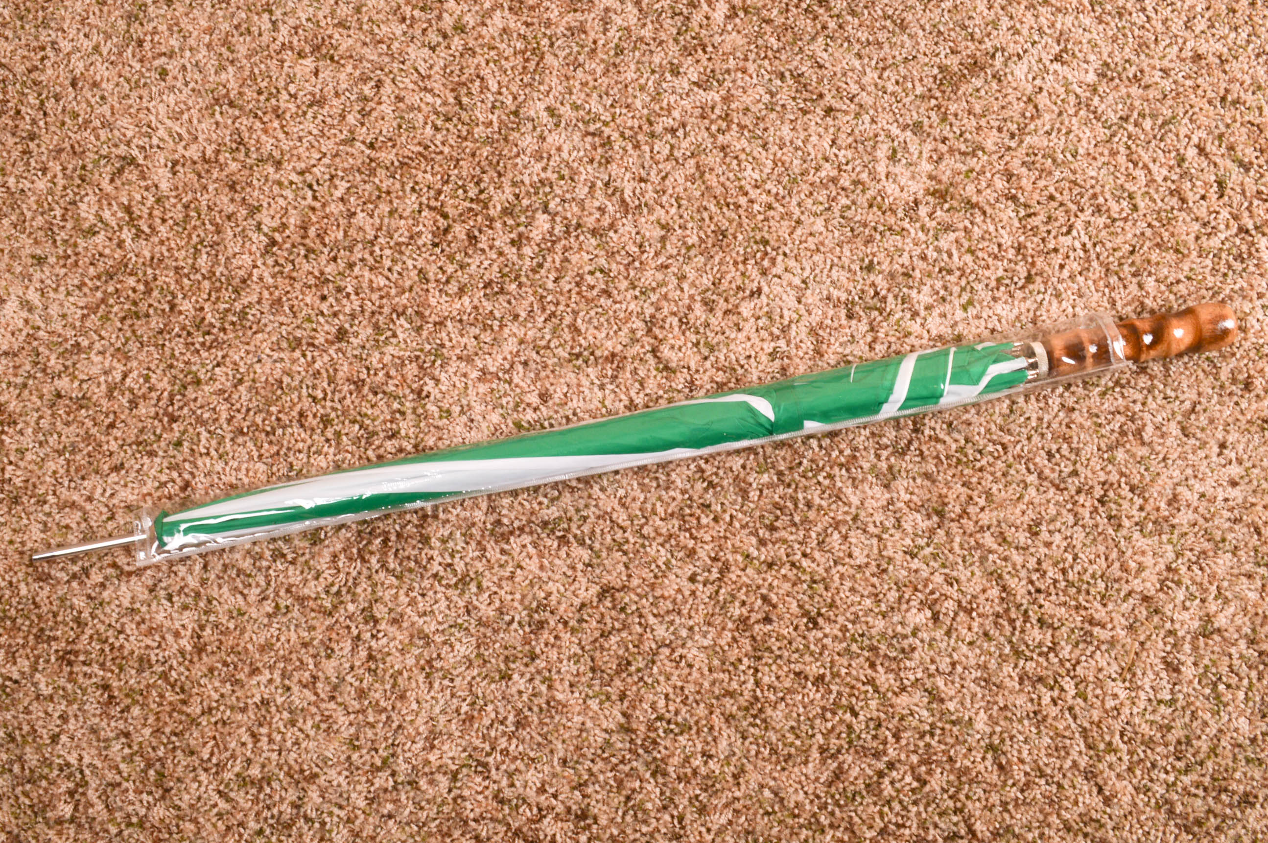 Grouping of Green and White Nylon Rain Umbrellas