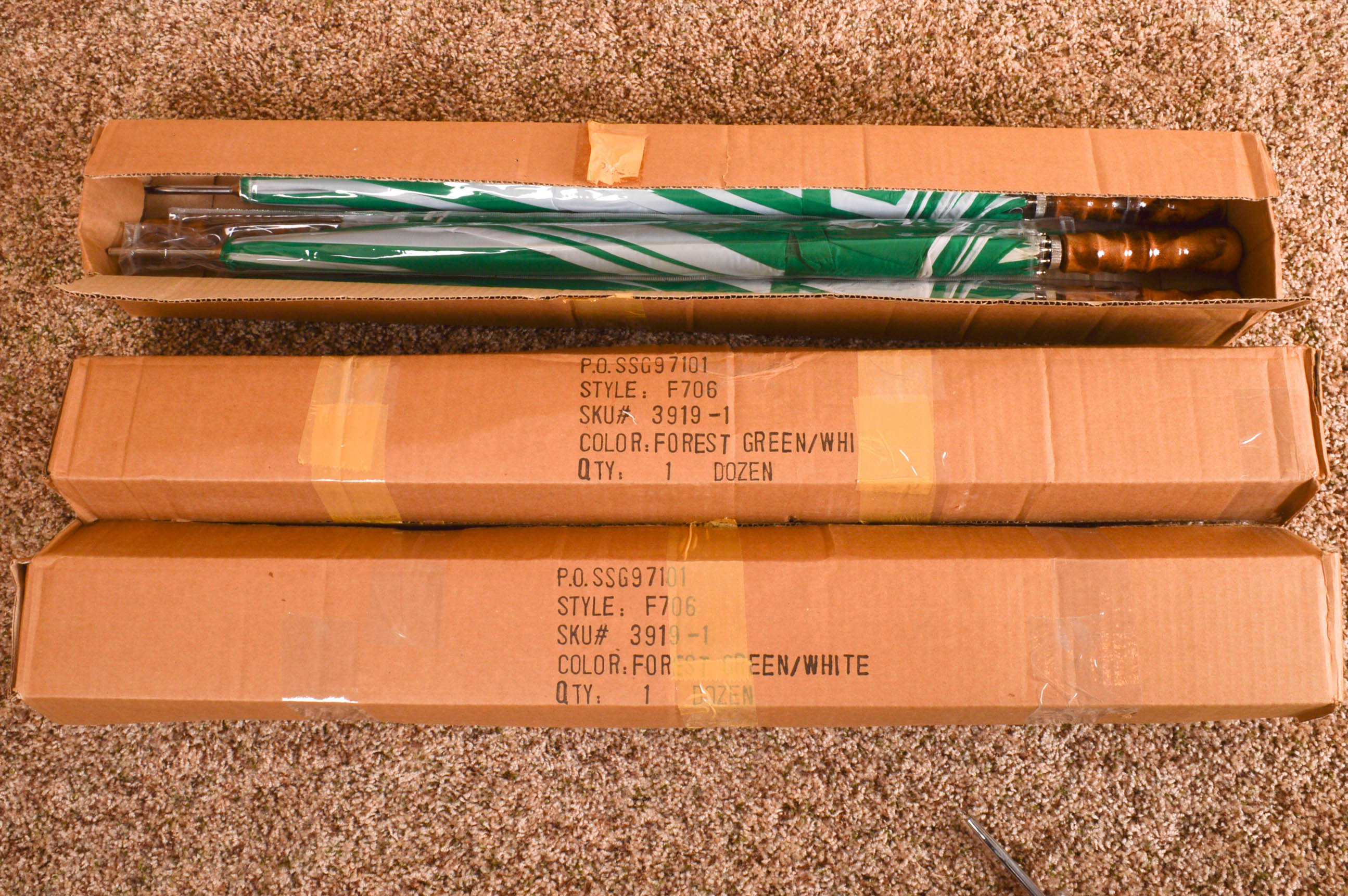 Grouping of Green and White Nylon Rain Umbrellas