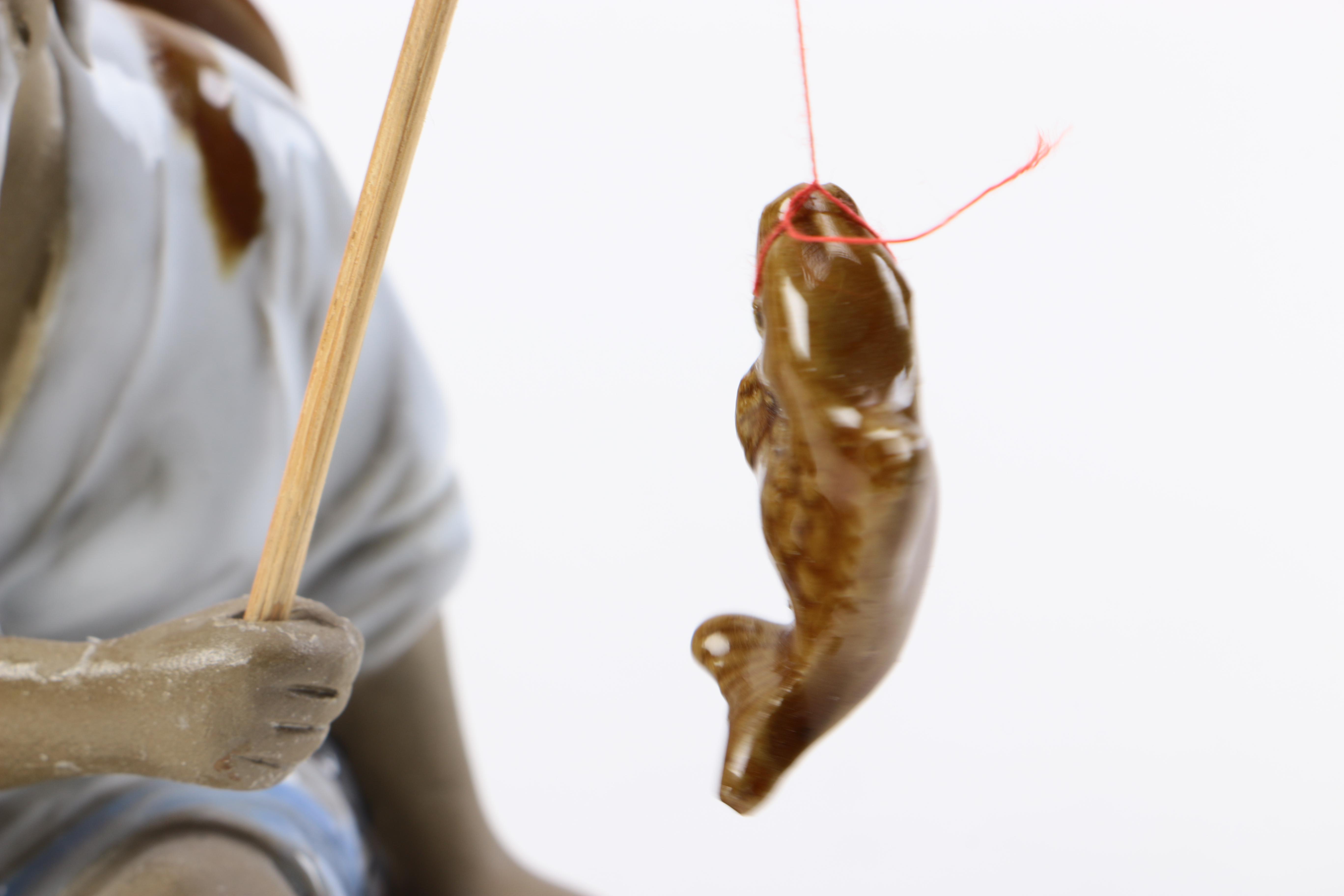 Chinese Shiwan Ware Ceramic Fisherman Figurine