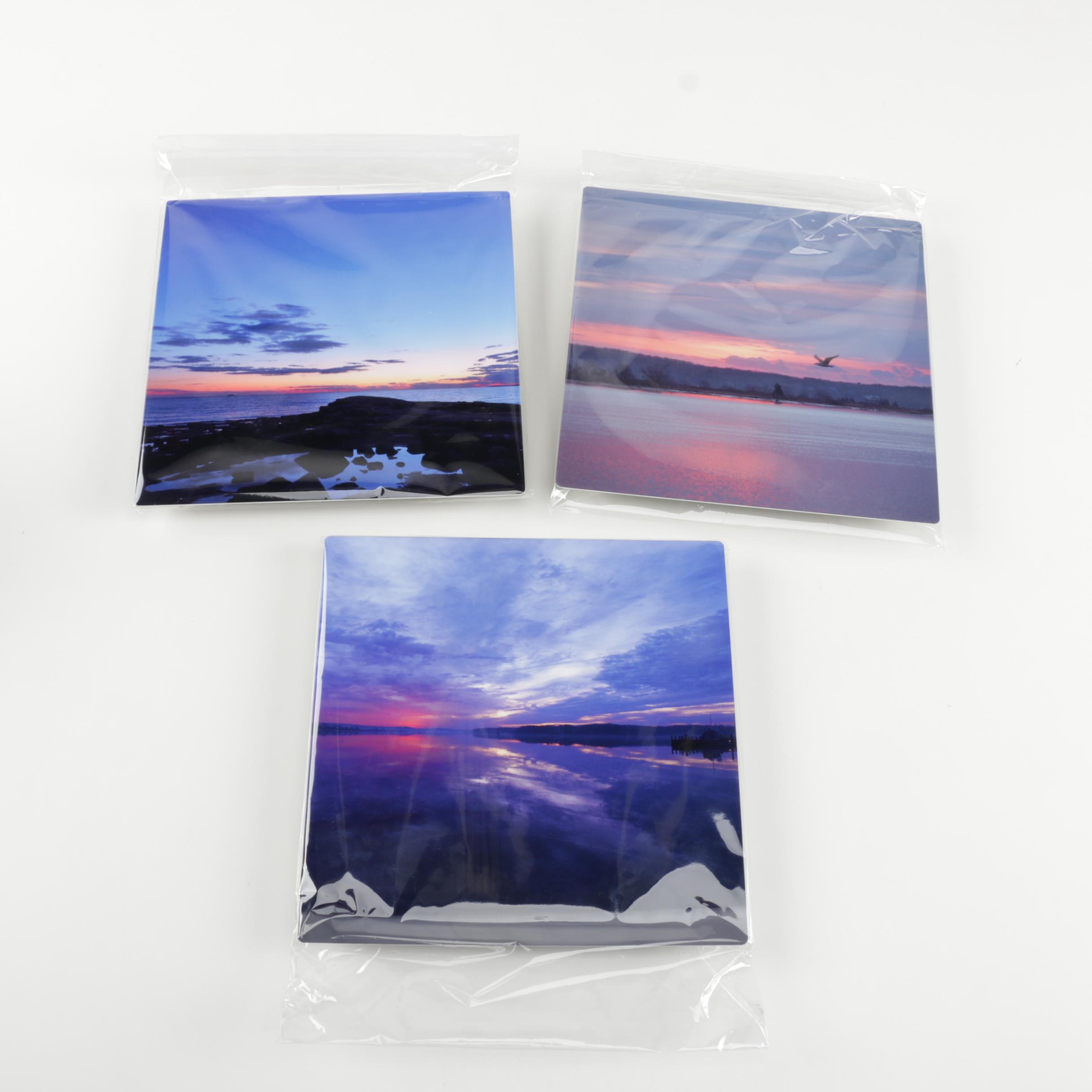 Digital Photographs of Sunrises Over Water