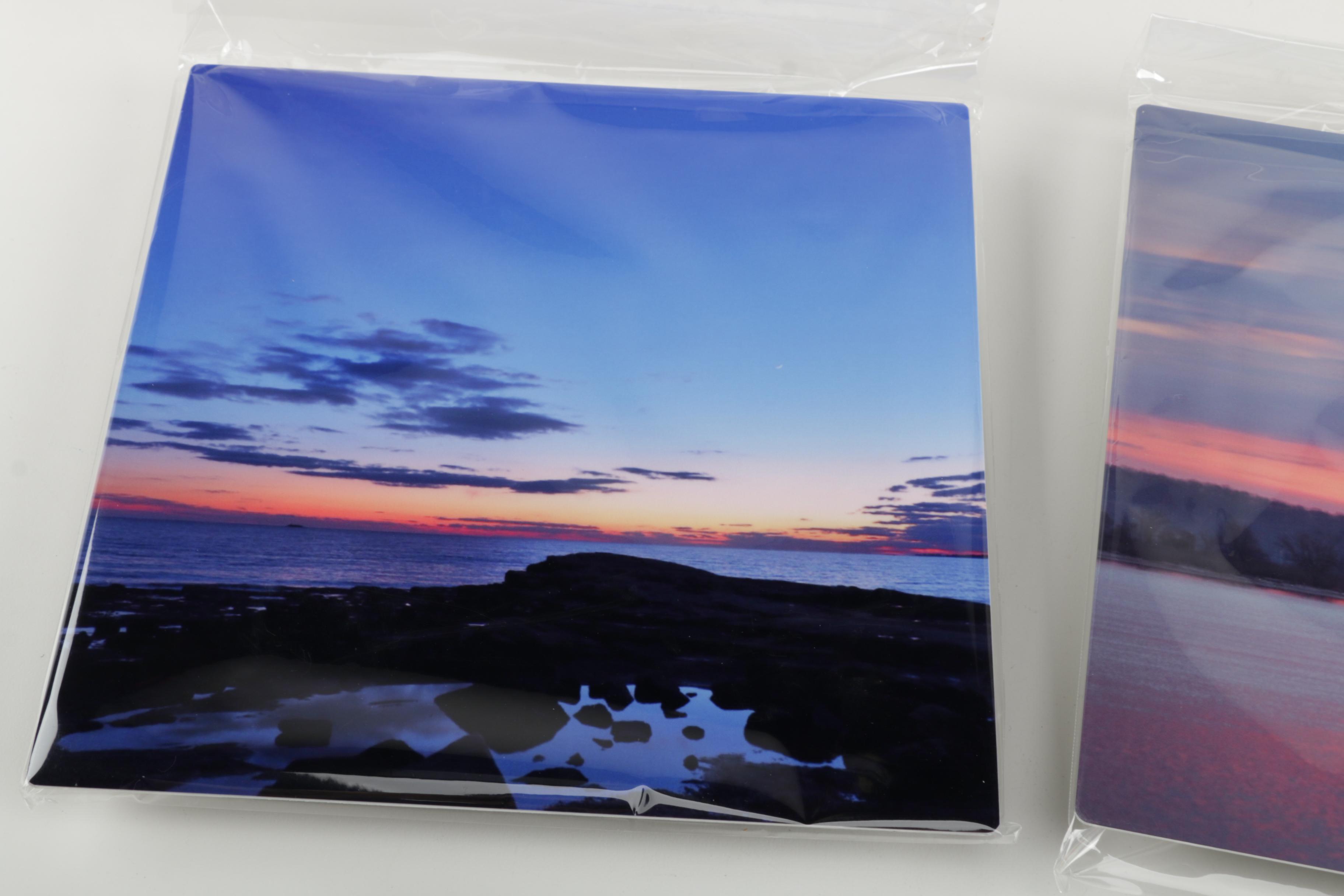 Digital Photographs of Sunrises Over Water