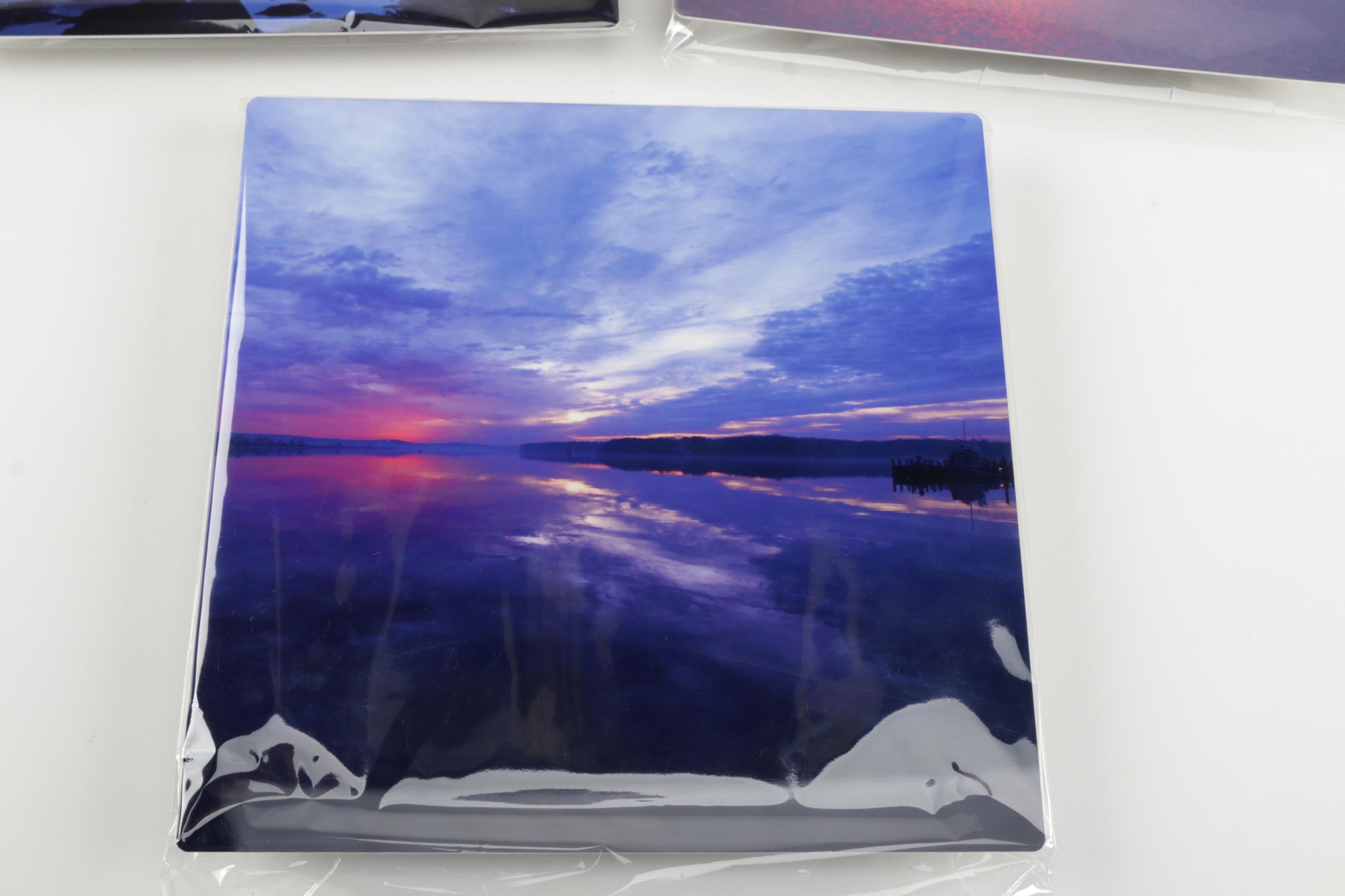 Digital Photographs of Sunrises Over Water